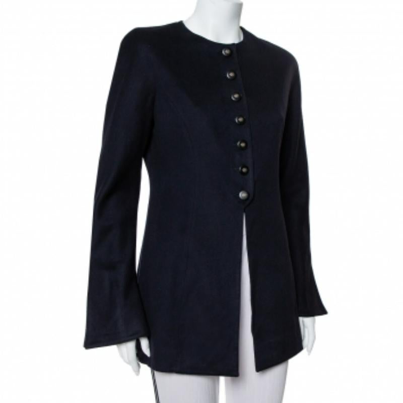 Valentino creations exude a sense of refined elegance and timeless allure. This vintage jacket is a testament to how the brand's creations will stay relevant through the years. It has been crafted from midnight blue cashmere and is cut to deliver a