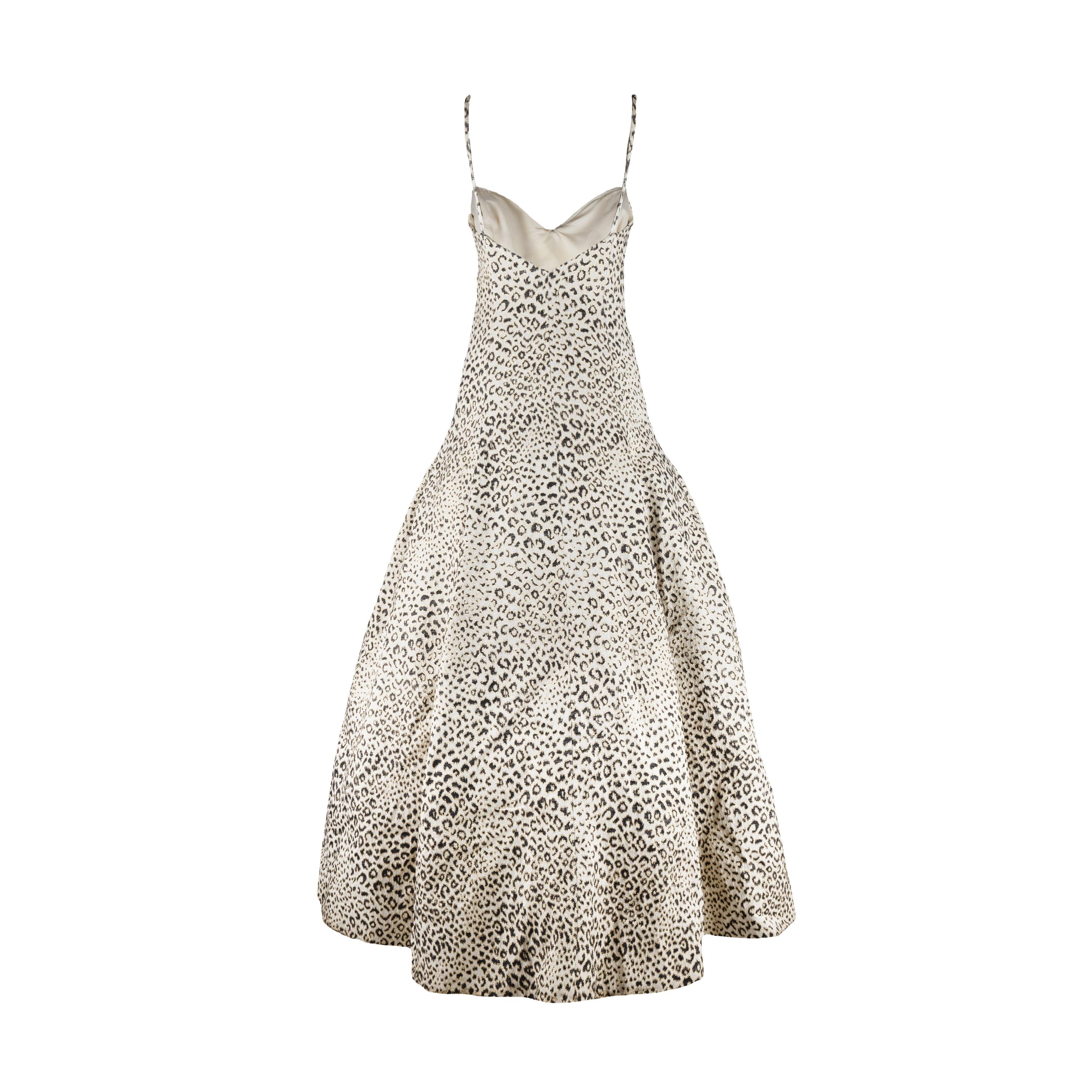 A statement-making piece from the Valentino Fall/Winter 1992 collection, this leopard printed ball gown is the ultimate vintage piece. The sweetheart neckline and fitted silhouette flatter the figure, while the side zipper closure and double lining
