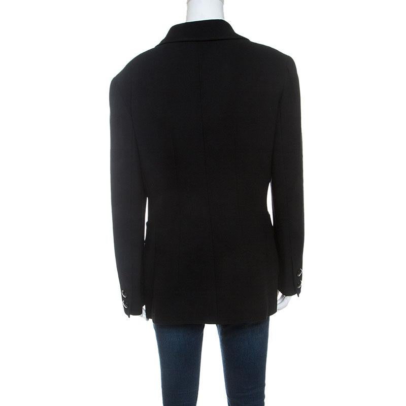 Gorgeous and comfortable, this blazer from Valentino Boutique will make others nod in admiration. The fabulous black blazer is tailored from quality fabrics, and it features front buttons and wide lapels.

