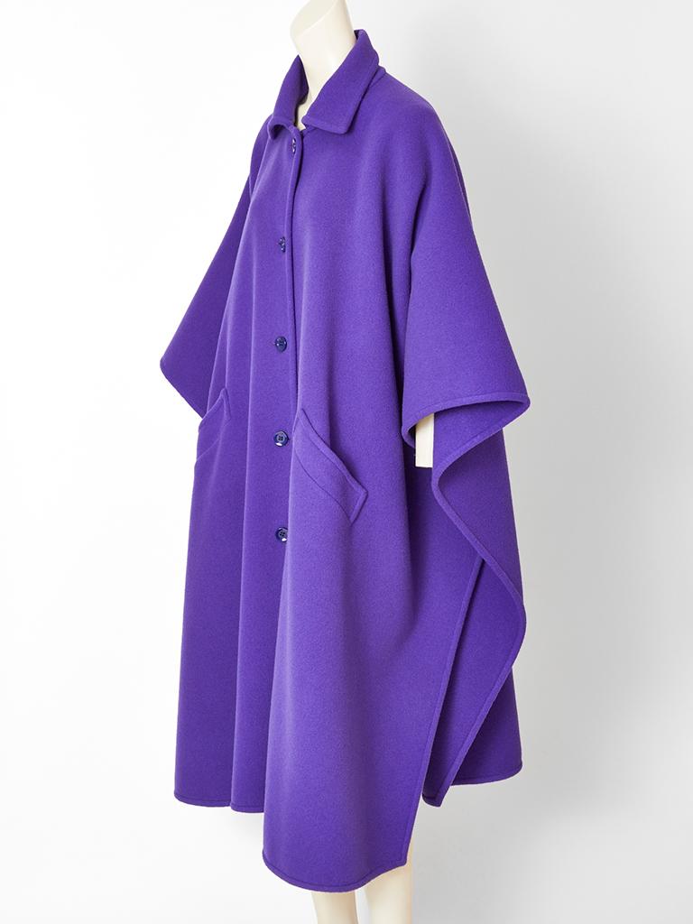 Valentino Boutique, purple wool cape having a small pointed collar, front button closures and deep slanted pockets. C. 1970's