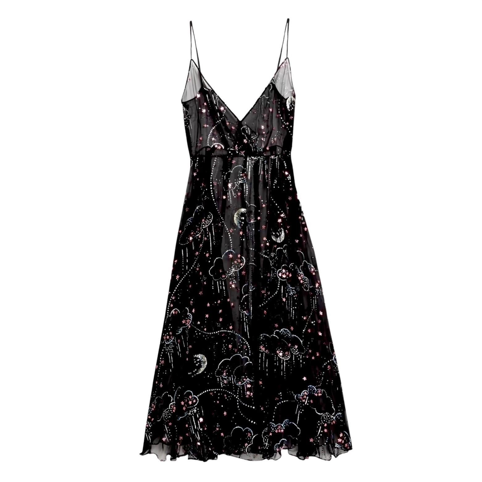 Gorgeous black silk evening gown by VALENTINO
From the FW 2016 collection
Wonderful deep plunge neckline
Clouds glitter motive
A dream seen on Selena Gomez 
Dry Clean only
Made in Italy
Retails for approximately 6800$
Size 42

Please refer to the