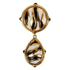 Valentino Brosche aus golden emailliertem Metall Spindel