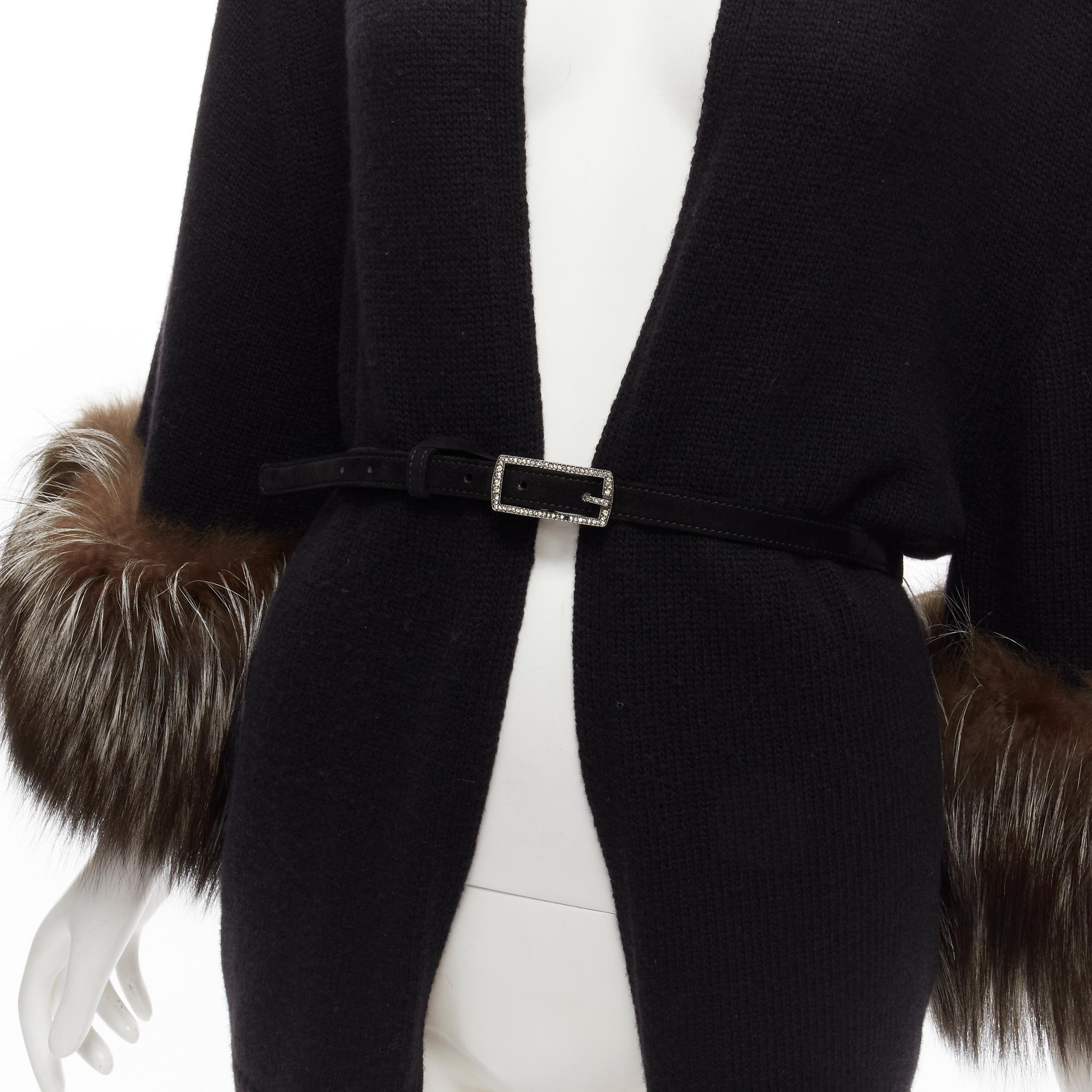VALENTINO brown fur cuff black wool cashmere belted poncho cardigan jacket

Reference: TGAS/C01670

Brand: Valentino

Designer: Pier Paolo Piccioli

Material: Virgin Wool, Cashmere, Fur

Color: Black, Brown

Pattern: Solid

Closure: Belt

Extra