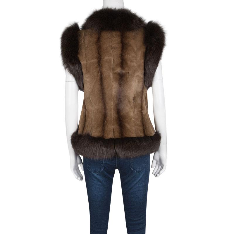 Fur has long been a material that is prized, giving fashion lovers the feel of luxury and class along with style. Over time, fur has become rarer, and it is not every day when one comes across a creation as stunning as this vest from Valentino! The