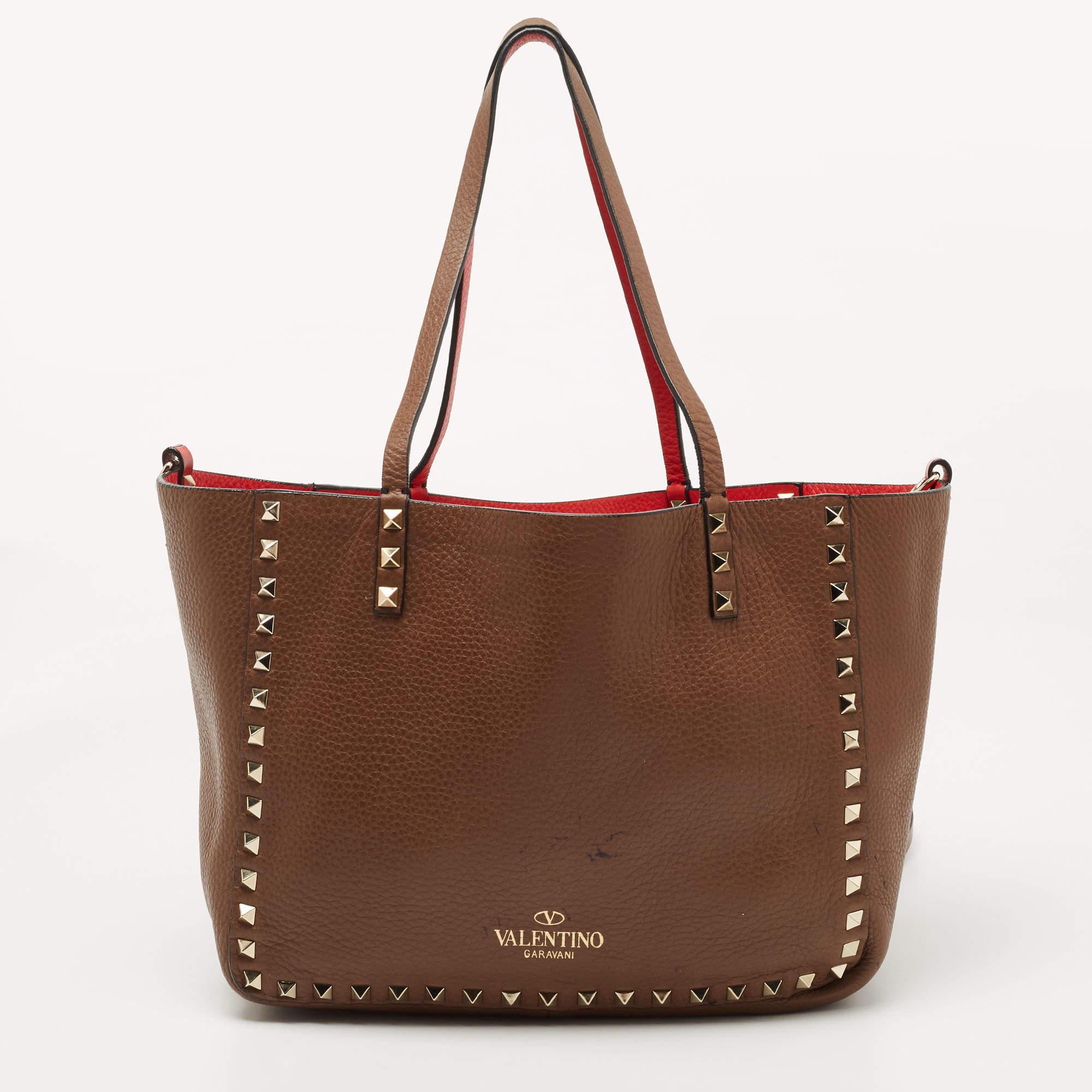 Carry everything you need in style thanks to this Valentino tote. Crafted from the best materials, this is an accessory that promises enduring style and usage.

Includes: Detachable Strap