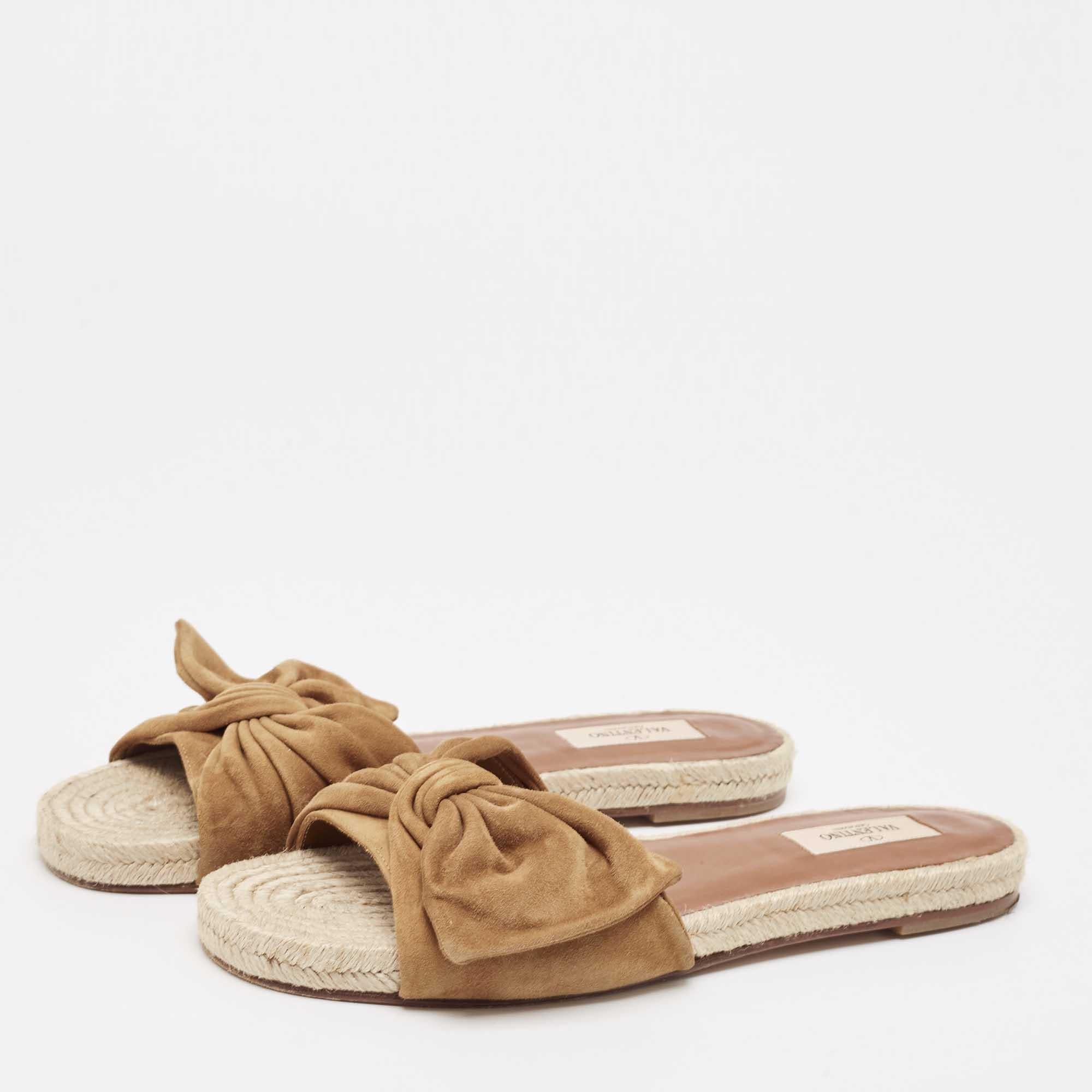 These designer espadrilles exude cool summer vibes while giving all the comfort to your feet. They bring along a well built silhouette and the houses signature aesthetics. Wear them with anything: jeans dresses shorts.