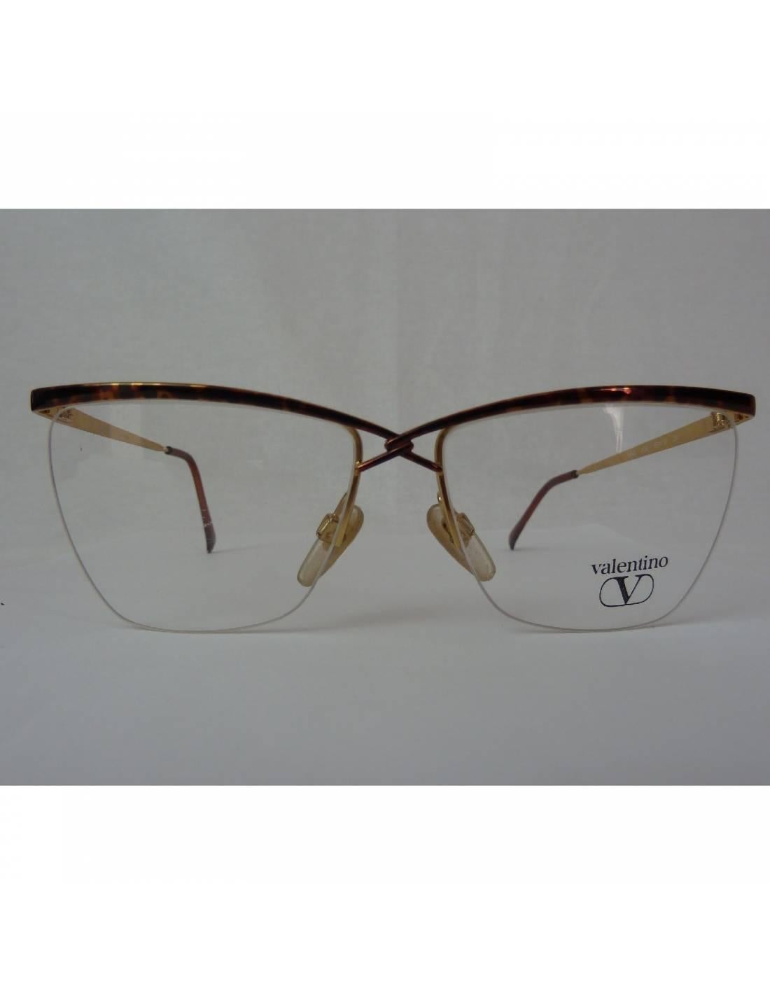 Valentino vintage eyeglasses for men, tortoise brown metal frame, 80s, made in Italy, new stock fund. Original case. Model V360.

Lenses: 55 mm
Bridge: 15 mm
Rod Length: 130 mm