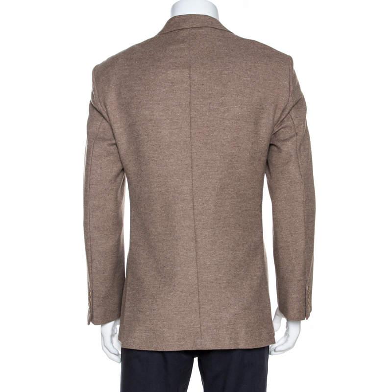 Exquisite and comfortable, this blazer from Valentino will make others nod in admiration. The fabulous brown blazer is tailored from a wool blend, and it features front buttons, pockets and notched lapels.

