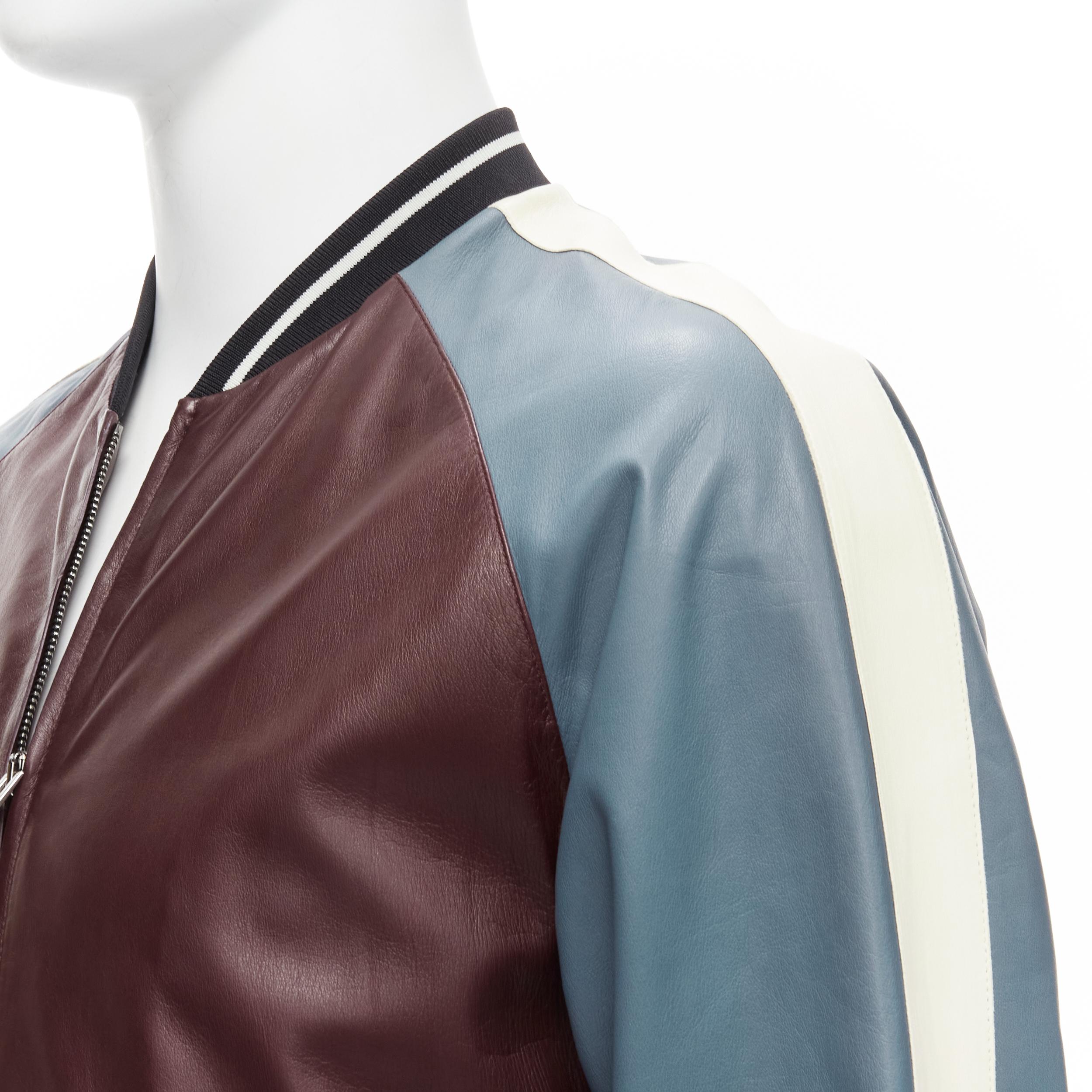 VALENTINO burgundy blue colorblock lambskin leather classic bomber FR48 M

Reference: YNWG/A00085

Brand: Valentino

Designer: Pier Paolo Piccioli

Material: Lambskin Leather

Color: Burgundy, Blue

Pattern: Solid

Closure: Zip

Lining: