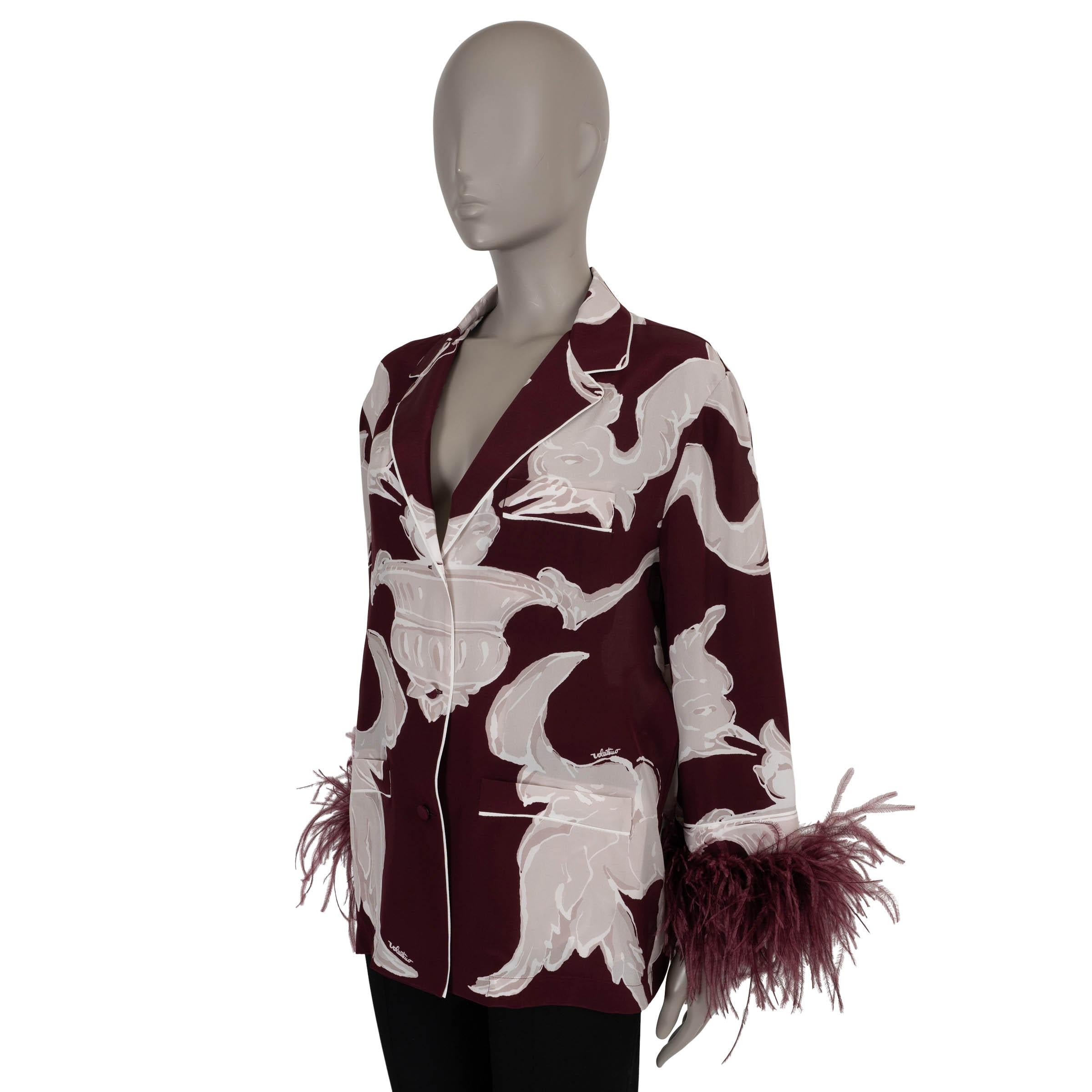 This 100% authentic Valentino pajama shirt in burgundy, taupe, and white Metamorphos Gryphos printed crêpe de chine silk (100%) embodies effortless elegance. Designed with a relaxed silhouette, it features slightly shorter sleeves adorned with
