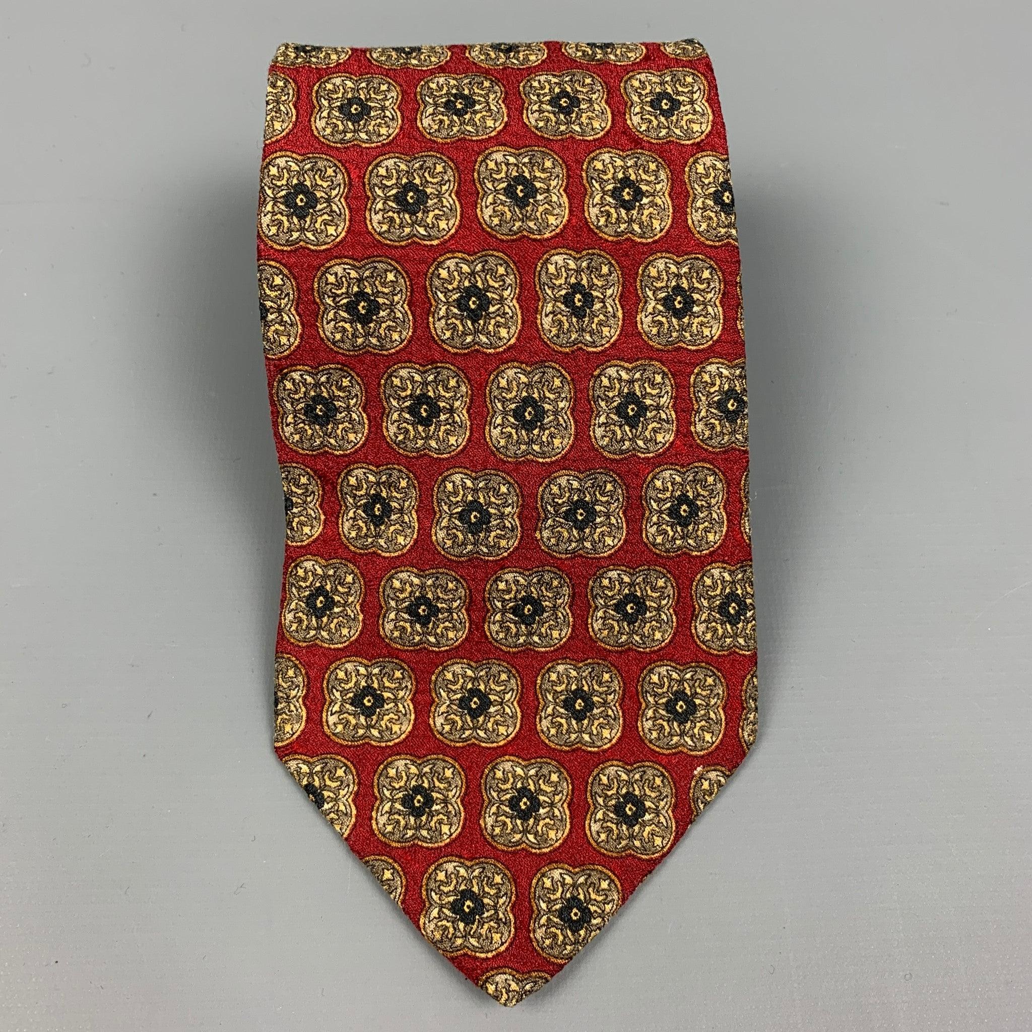 VALENTINO neck tie comes in a burgundy & taupe tapestry silk. Made in Italy.
 Very Good
 Pre-Owned Condition. 
 

 Measurements: 
  Width: 4 inches 
  
  
  
 Sui Generis Reference: 112516
 Category: Tie
 More Details
  
 Brand: VALENTINO
 Color: