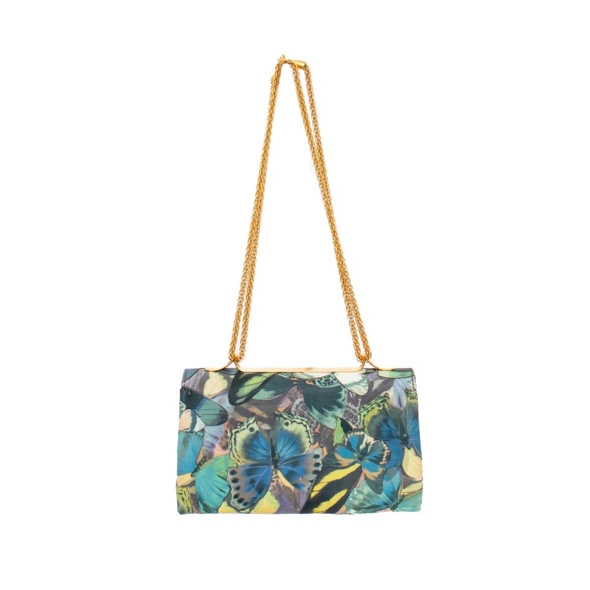 Butterfly print tote by Valentino
Made in Italy
Multicolored
Butterfly cut-out appliques 
Gold hardware
Inner zippered pocket
Leather lining
Snap closure with decorative gold butterflies
Strap adjustable; can be doubled or worn on shoulder