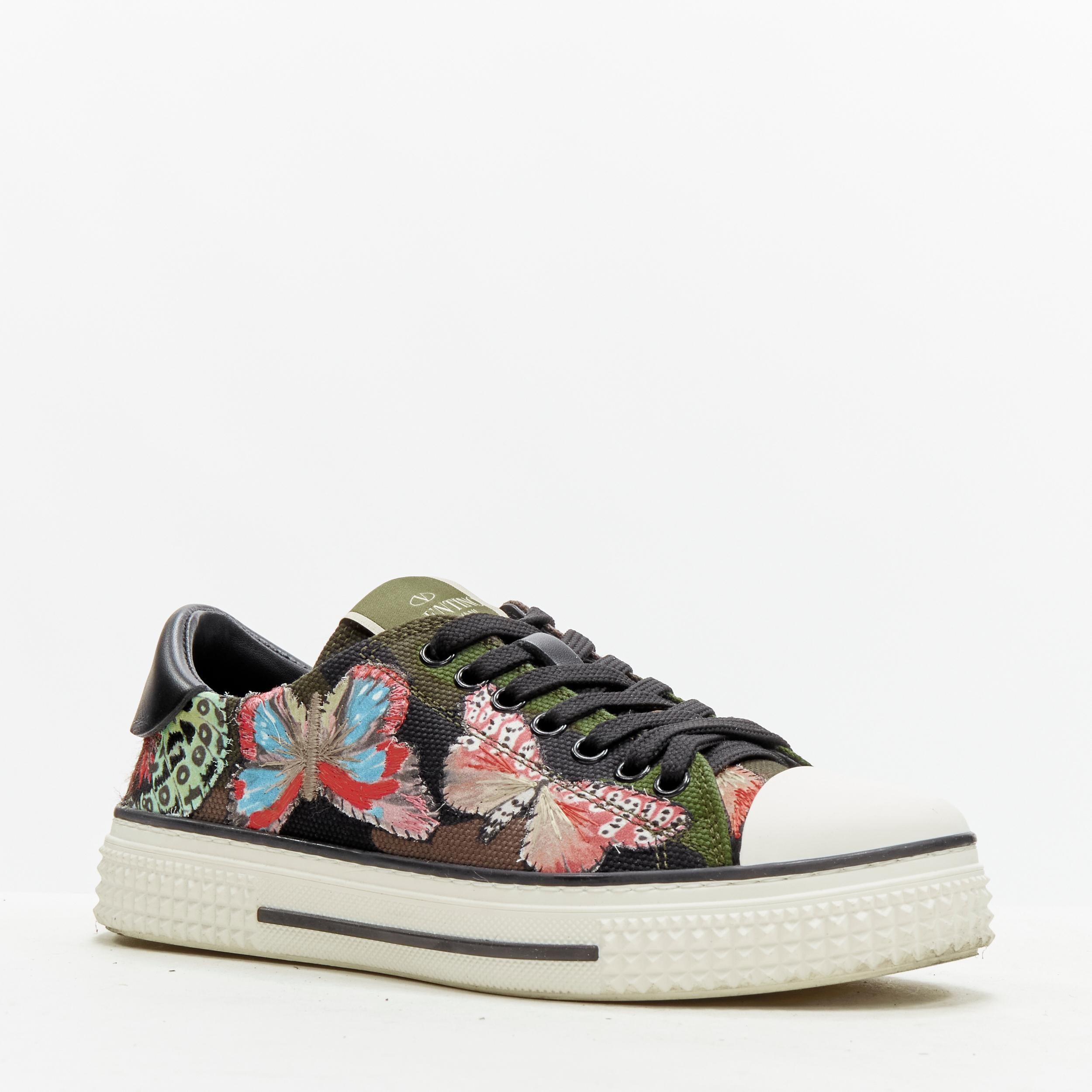 VALENTINO Butterfly embroidery green camouflage low top sneaker EU36 
Reference: ANWU/A00337 
Brand: Valentino 
Material: Canvas 
Color: Green 
Pattern: Camouflage 
Closure: Lace 
Extra Detail: Rockstud textured rubber outsole. 
Made in: Italy