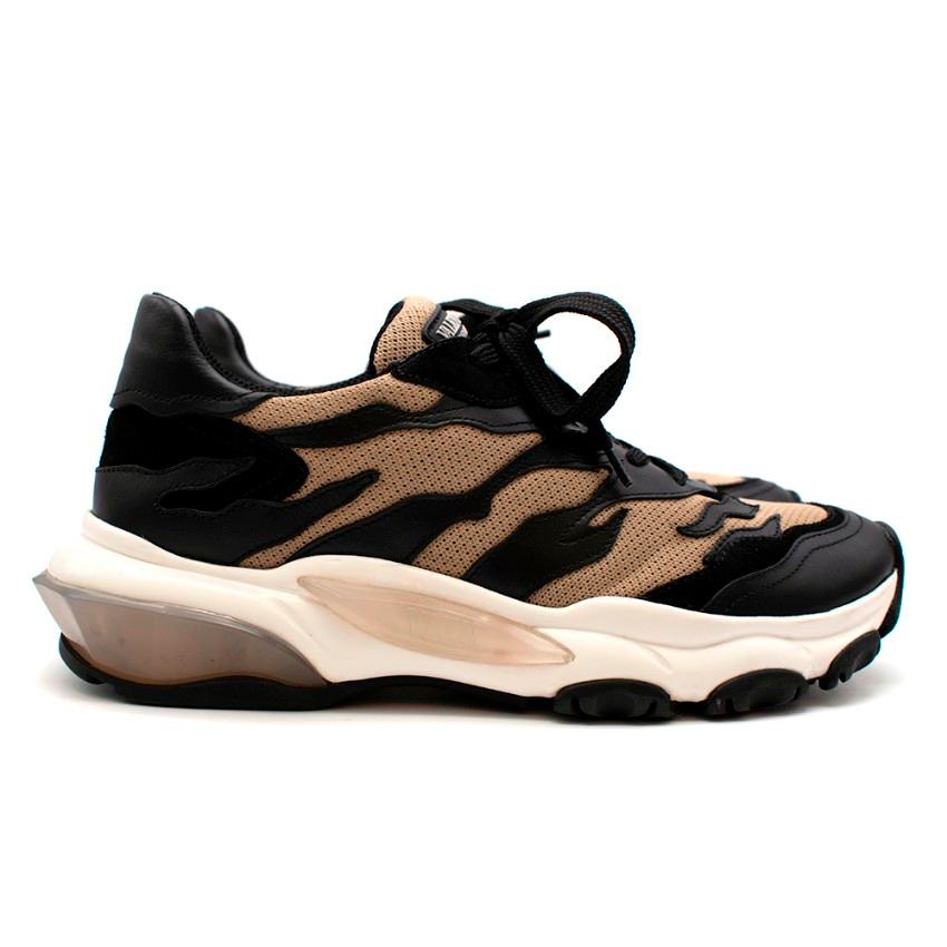 Valentino Bounce Trainers 37

- Camel and black coloured trainers
- Lace up detailing
- Mesh material with leather front and back panels
- White sponge soles with black coloured grip
- Padded at the ankles for comfort 

Fabric Composition:
Leather