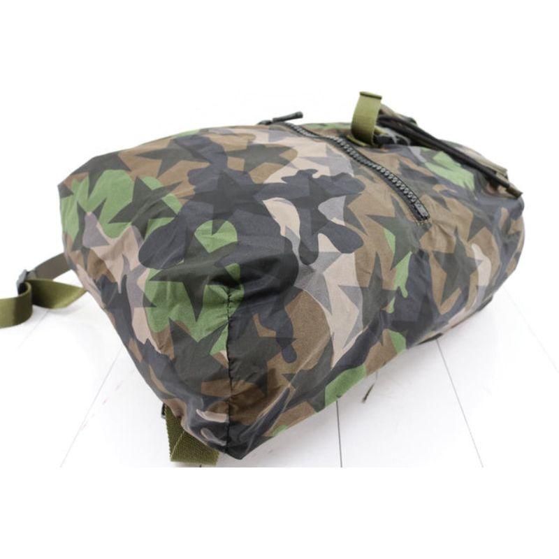 Gray Valentino Camustars backpack features green Camouflage and black stars printed For Sale