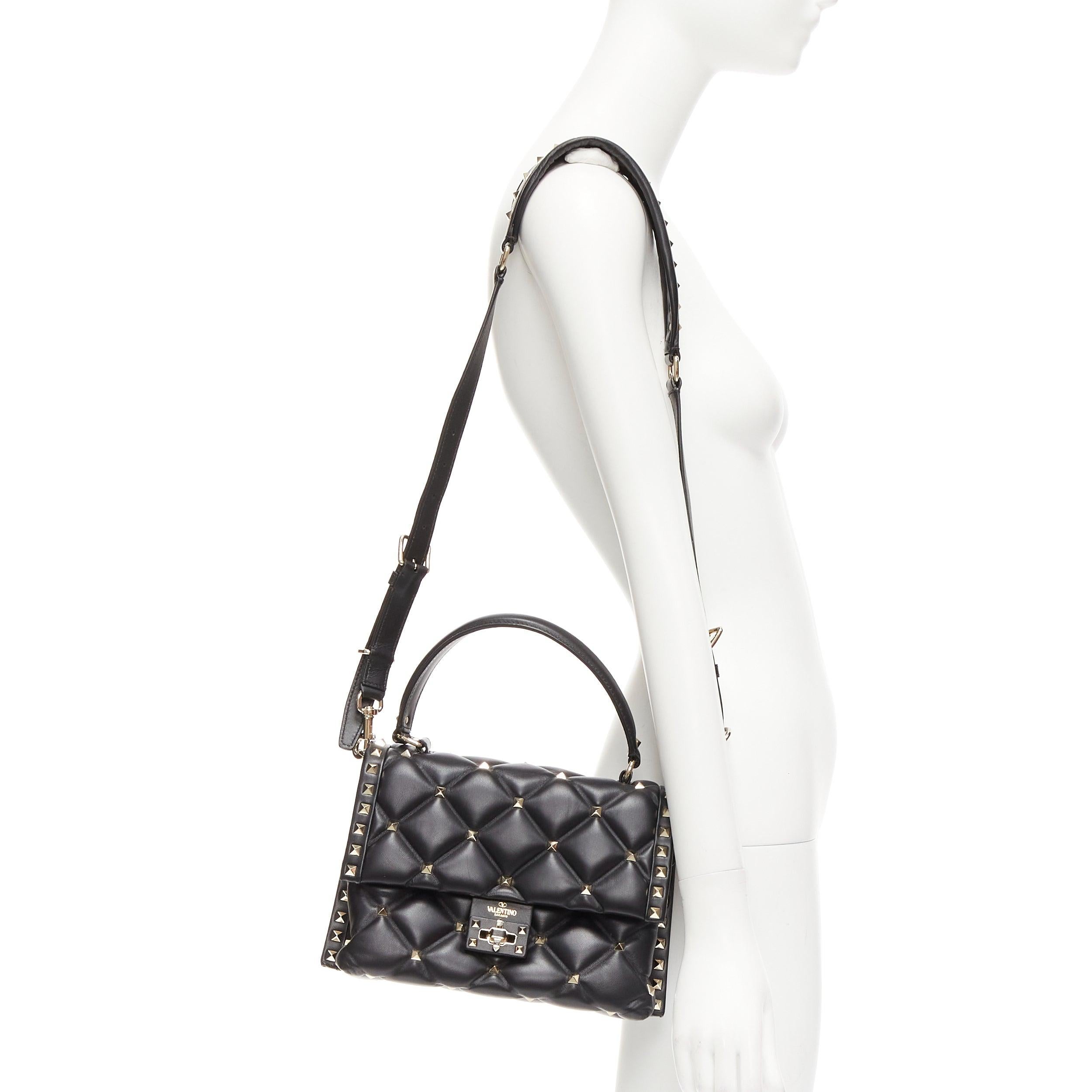 VALENTINO Candystud black nappa lambskin gold studded turnlock 2 way satchel bag
Reference: TGAS/E00048
Brand: Valentino
Model: Candystud
Material: Leather
Color: Black, Gold
Pattern: Studded
Closure: Turnlock
Lining: Black Fabric
Extra Details: