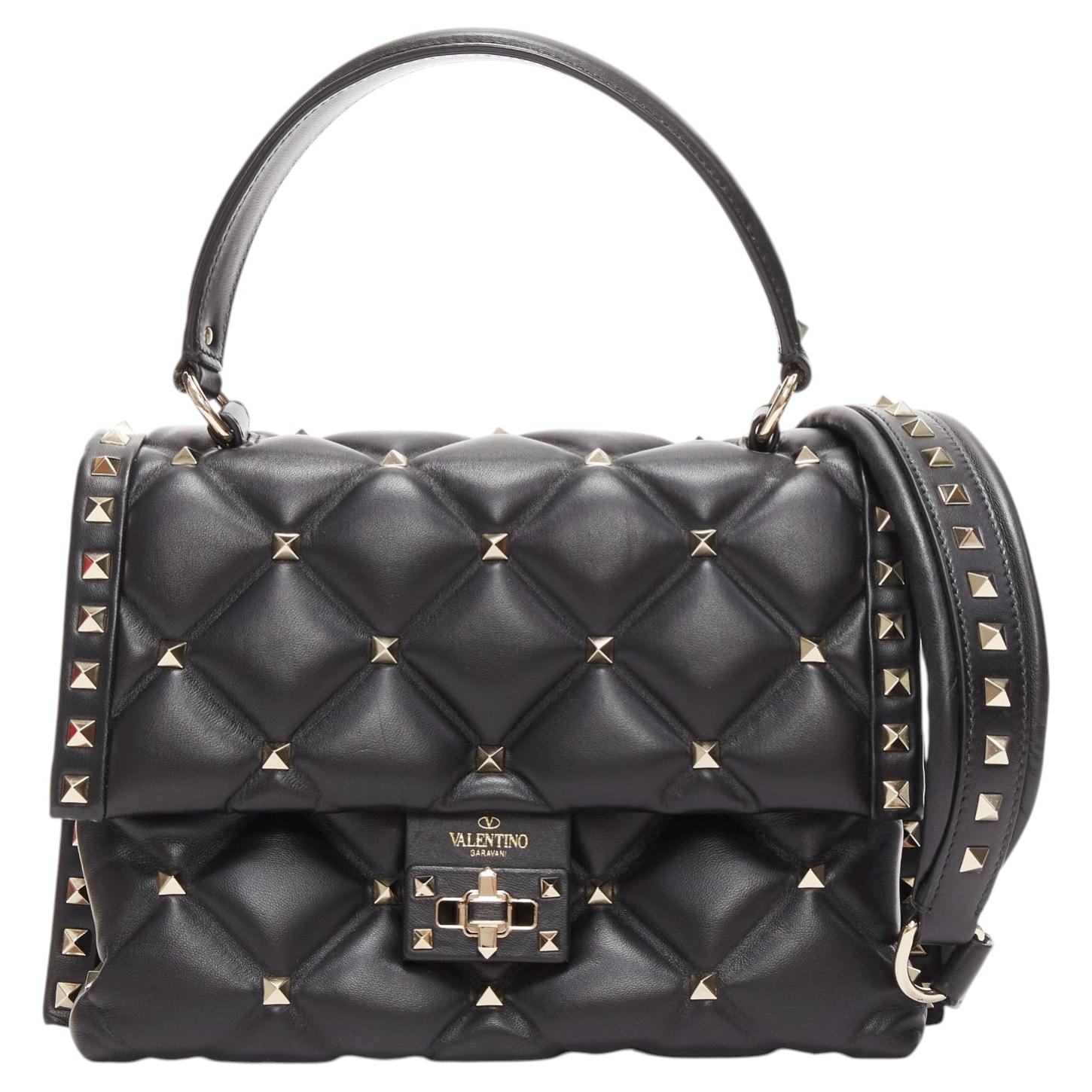 Valentino Candystud in pelle di agnello nera con borchie dorate, borsa a tracolla turnlock a due vie