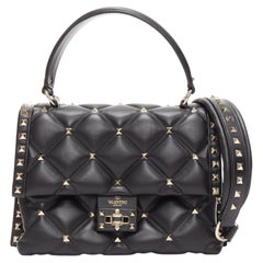 VALENTINO Candystud black nappa lambskin gold studded turnlock 2 way satchel bag