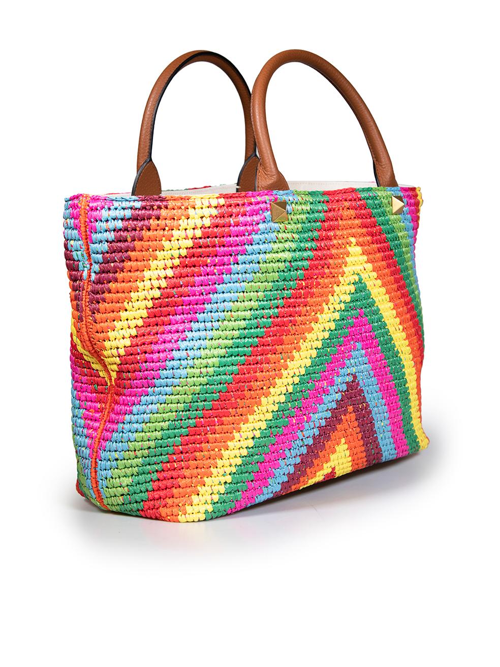 CONDITION is Very good. Hardly any visible wear to bag is evident on this used Valentino designer resale item.
 
 
 
 Details
 
 
 Multicolour - rainbow
 
 Raffia
 
 Large tote bag
 
 Chevron pattern
 
 2x Brown leather top handles
 
 1x Detachable