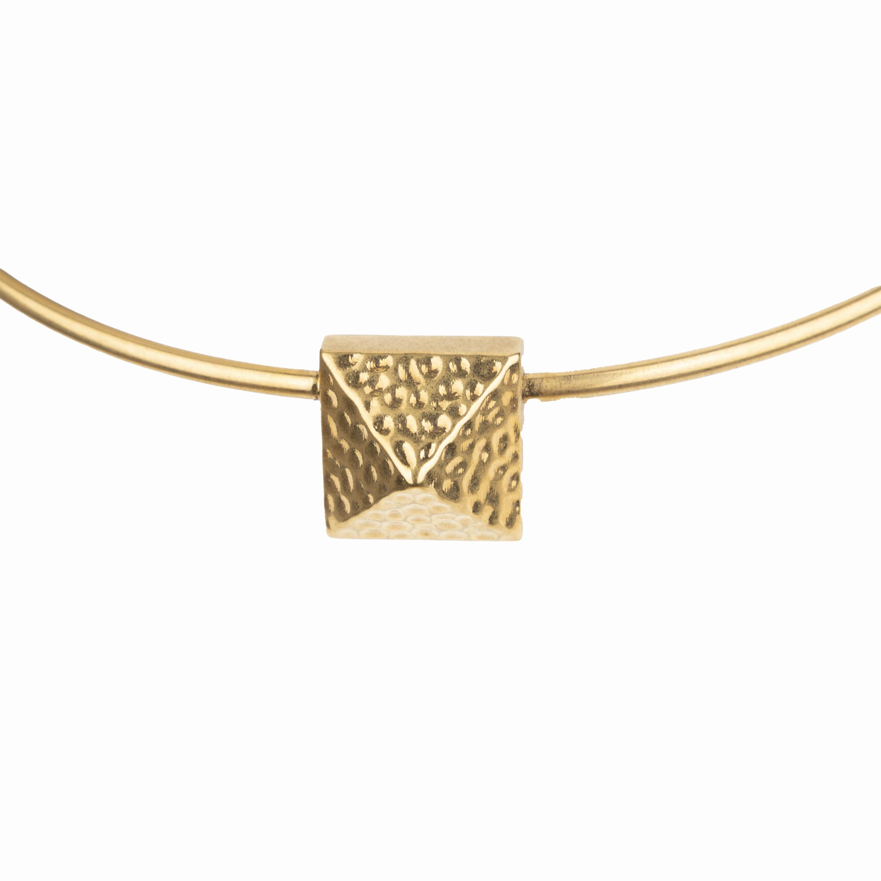 Elevate your look with the Valentino Choker Necklace. Made from gold plated metal, this choker style necklace features a striking pyramid pendant with textured metal at the center. The V logo and 
