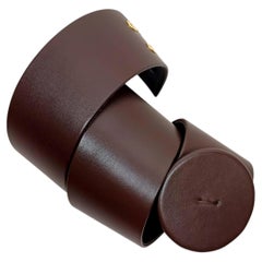 Vintage Valentino high-waisted brown leather belt with a large round buckle from the 1990s