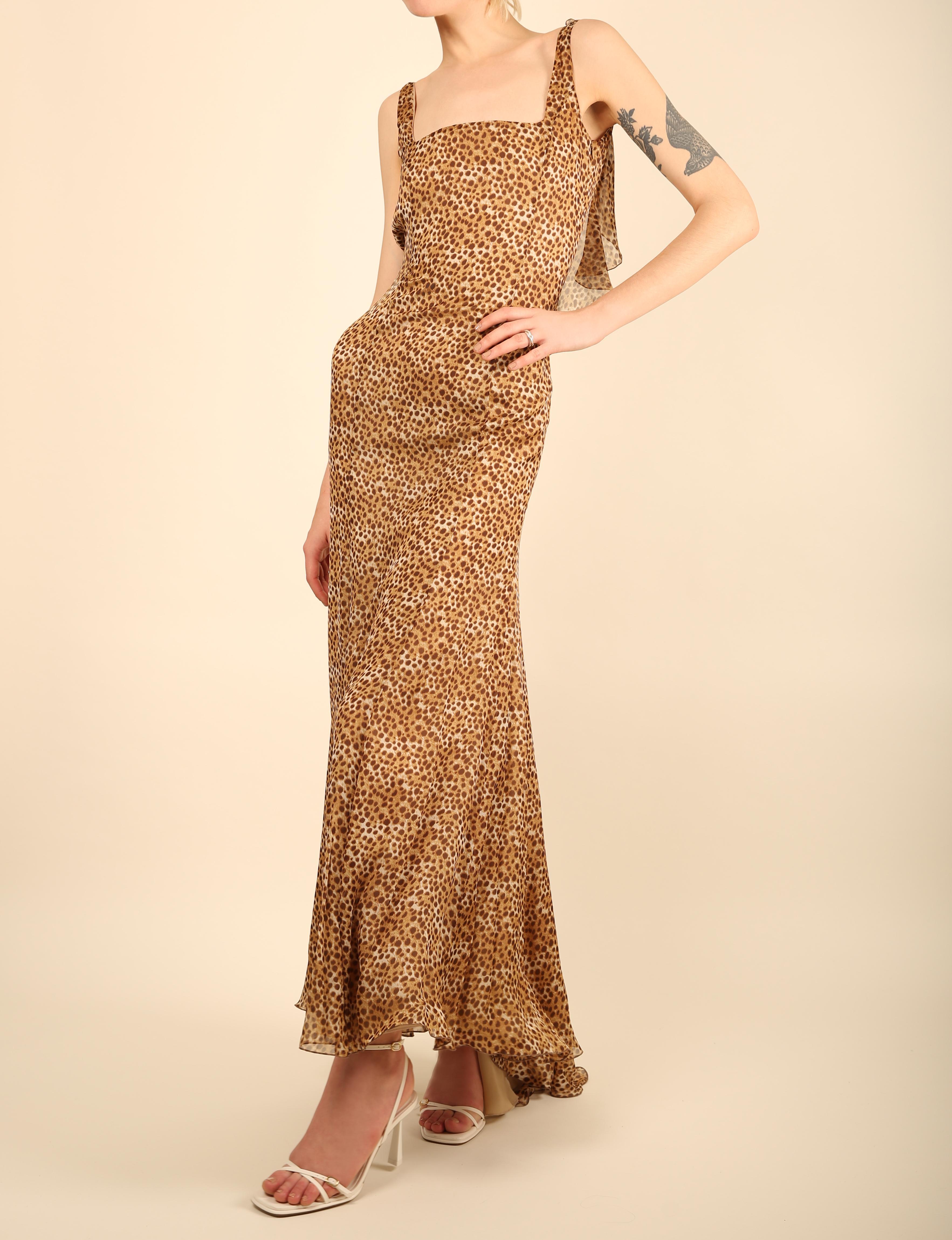 Valentino circa 1990
Floor length leopard print gown - Please note are model is extremely tall, so this would fall longer on someone else creating much more of a train at the back - please refer to the measurements below
Sleeveless dress which has