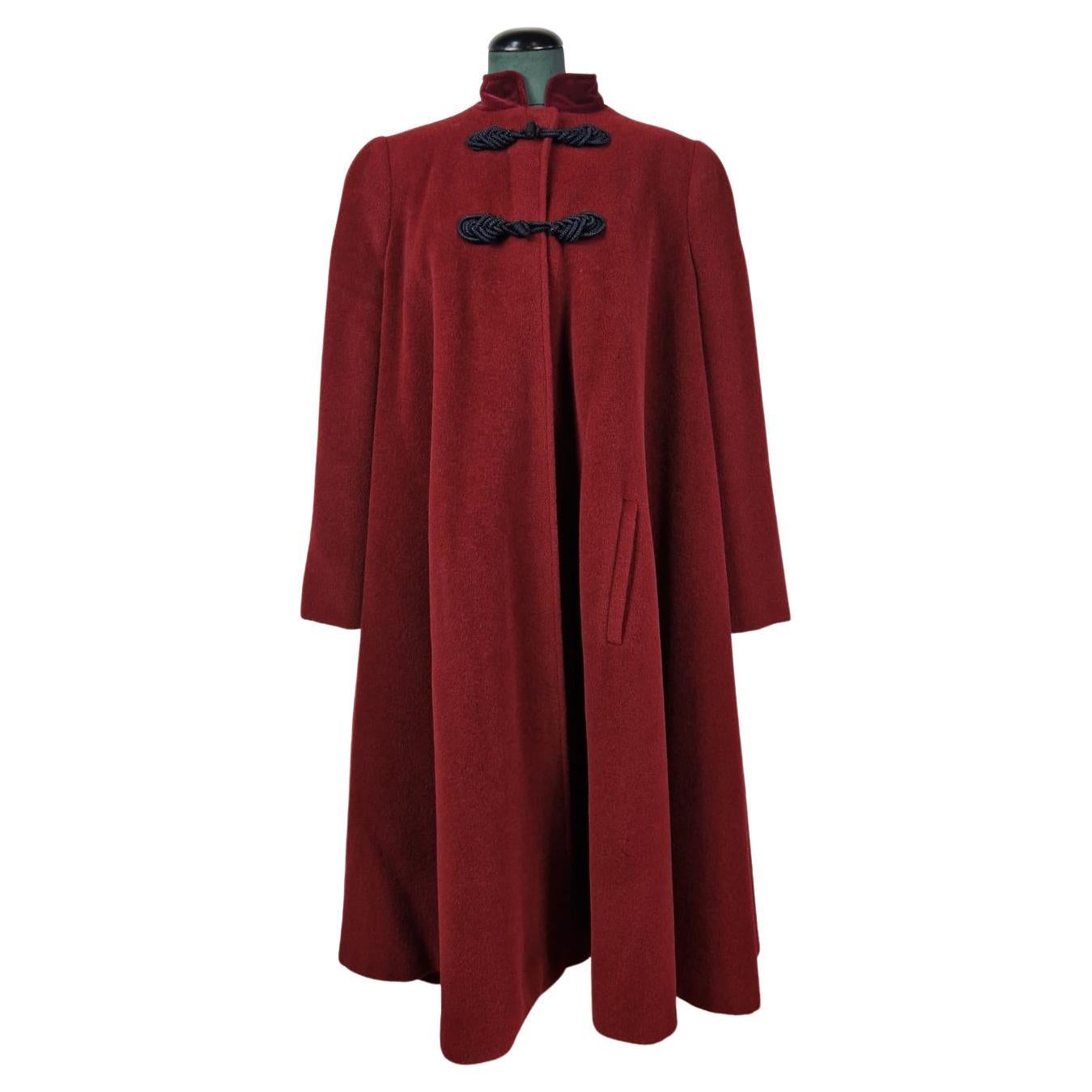 Valentino coat in burgundy wool.