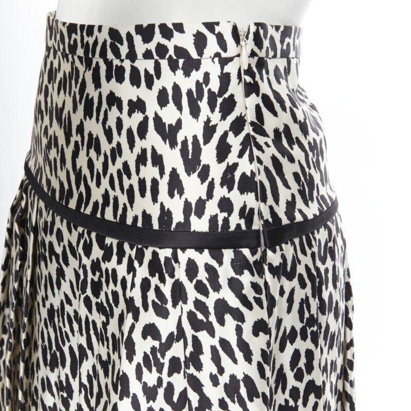 VALENTINO cotton silk black white leopard spot print pleated flared skirt IT38
Reference: LNKO/A01558
Brand: Valentino
Designer: Pier Paolo Piccioli
Material: Cotton, Silk
Color: White, Black
Pattern: Leopard
Closure: Zip
Extra Details: Pleated