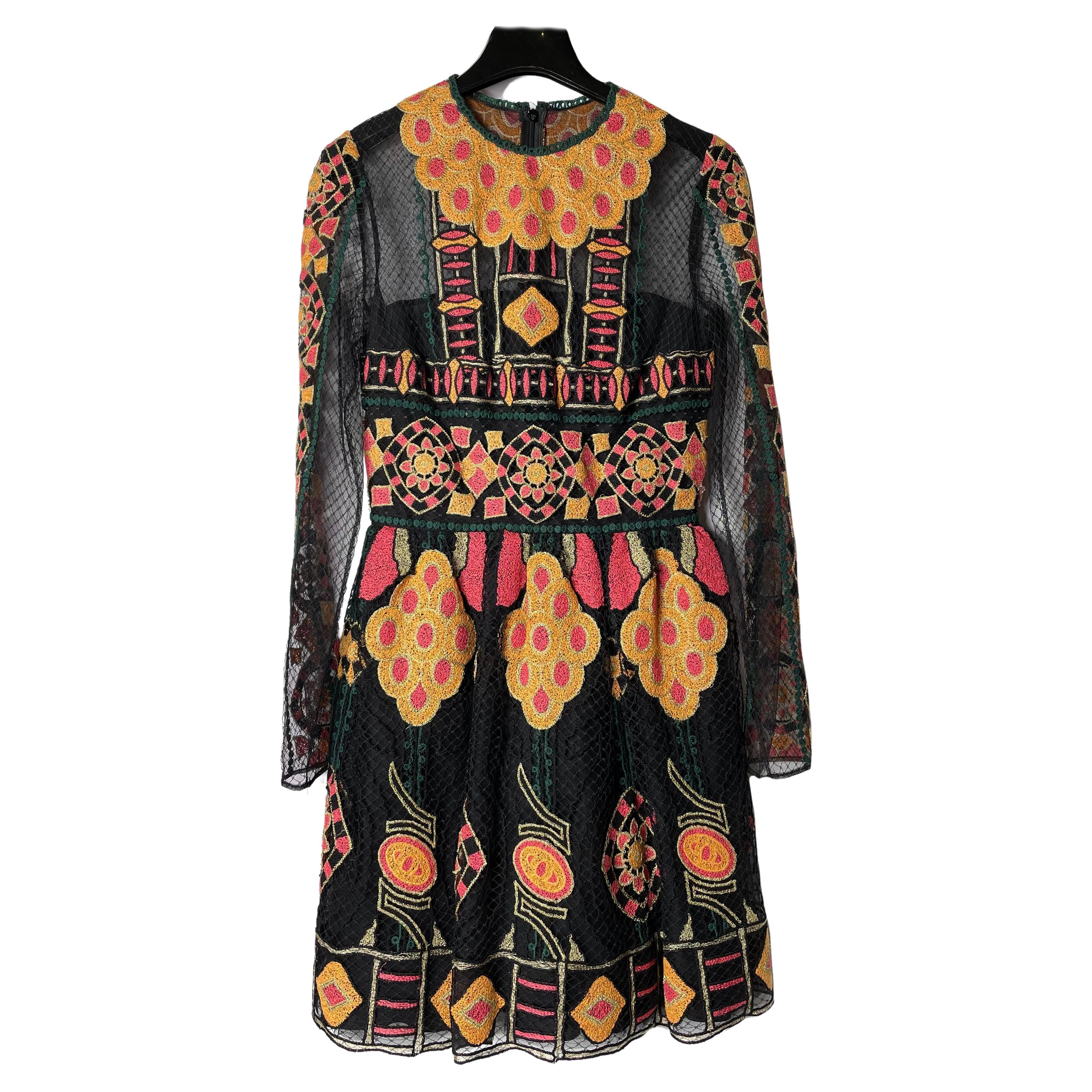 Stunning Valentino couture dress.
Collection Spring 2014

Black mesh dress embroidered with multi-colored ornament. 

Fastens with a zipper on the back. 

Size – IT38 / XS-S

Length – 81 cm

Waist – 64 cm

Sleeve – 60 cm

Armpit to armpit – 39