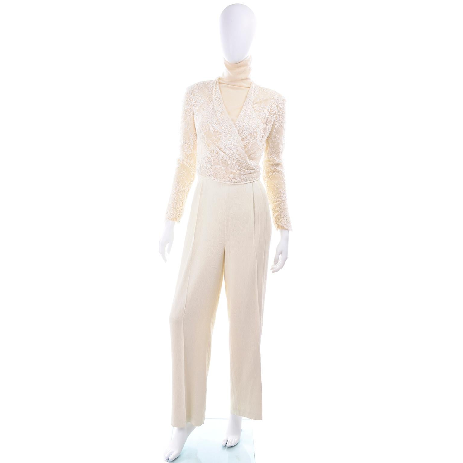 This beautiful, sophisticated Valentino outfit includes a cream cashmere turtleneck sweater, an ivory lace wrap top and a pair of beautiful textured woven high waist trousers. The pants don't have a content label but feel like a silk or rayon crepe
