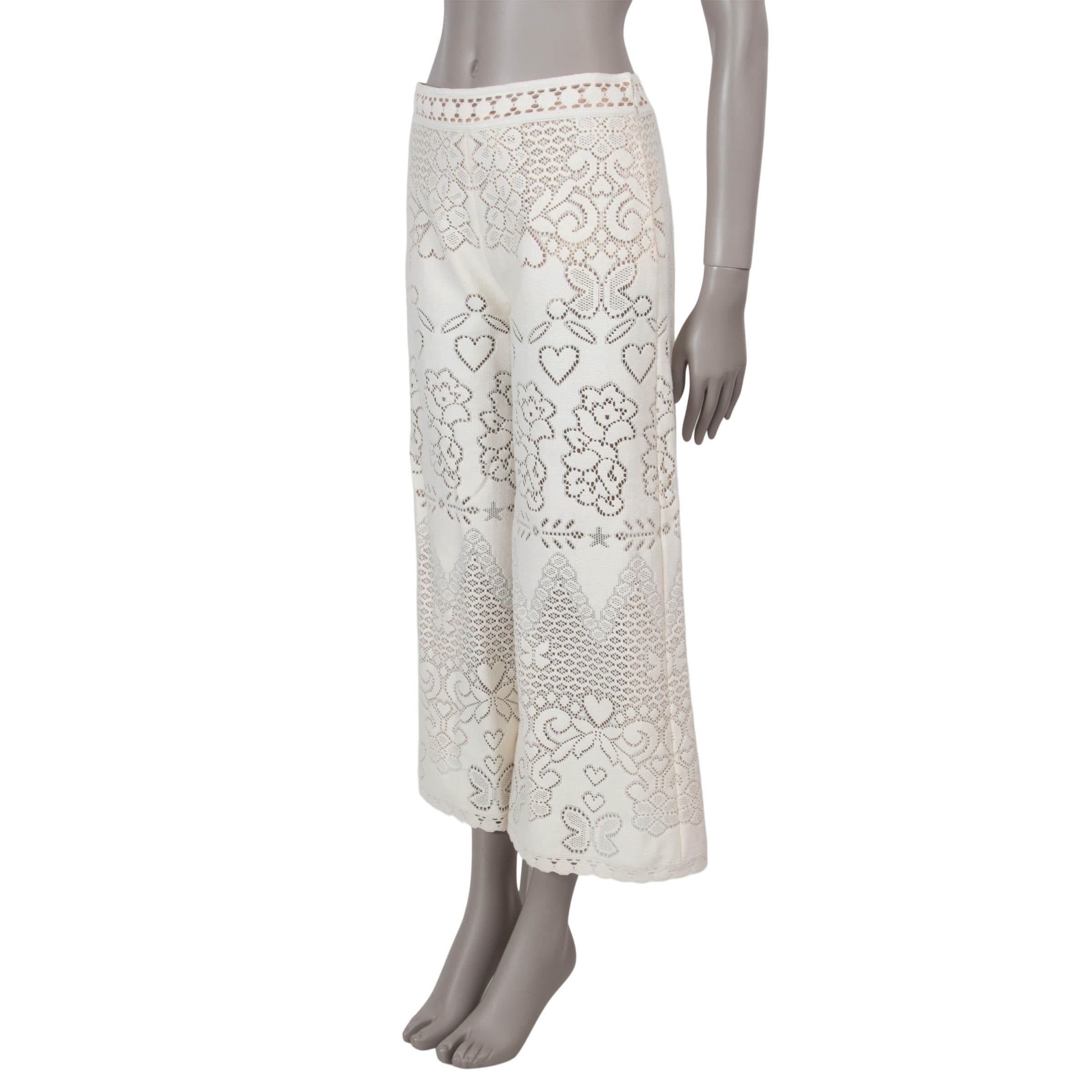 100% authentic Valentino culotte pants in Almond (cream) cotton (77%) and polyamide (23% - please note the content tag is missing) with intricate floral pointelle detailing. These elegant pants feature a flattering high-waisted silhouette with