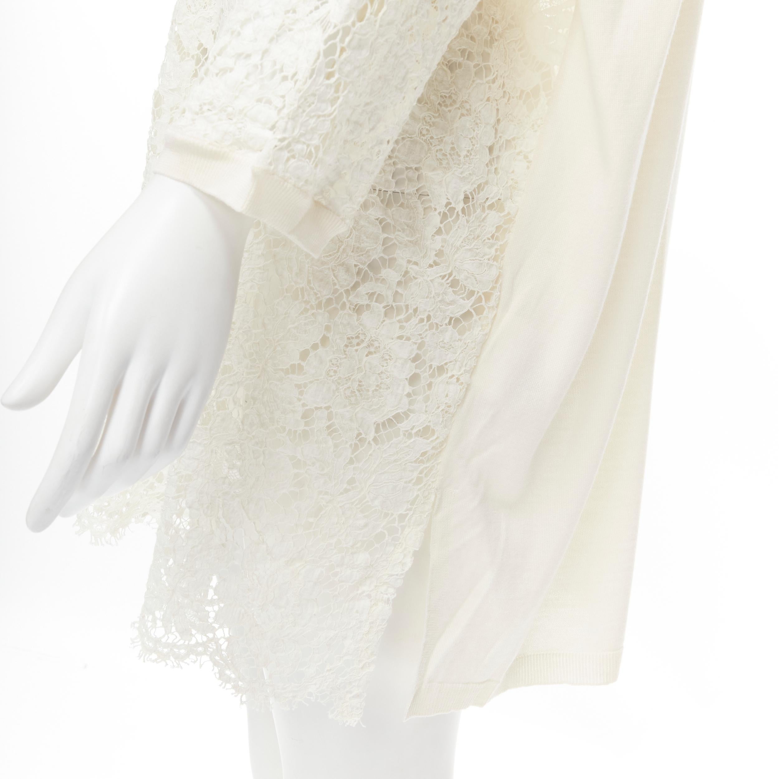 VALENTINO cream floral lace front wool silk cashmere knit back casual dress M 
Reference: MELK/A00093 
Brand: Valentino 
Material: Wool 
Color: Beige 
Pattern: Solid 
Made in: Italy 

CONDITION: 
Condition: Good, this item was pre-owned and is in