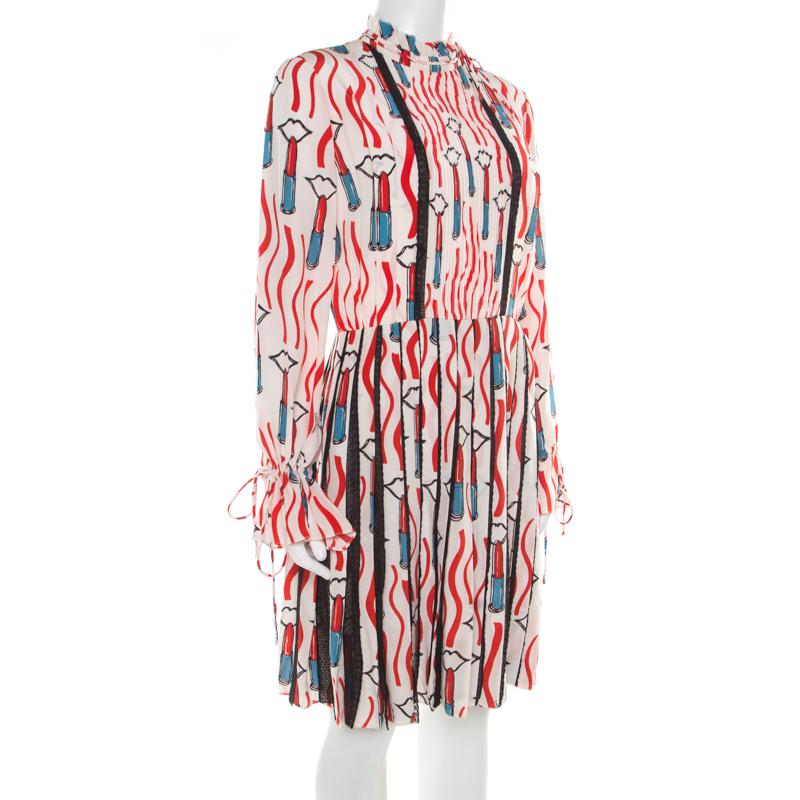 Opt for this piece from Valentino as it is beautifully made and simply pleasing to the eyes. Tailored from quality fabrics, the dress has lipstick prints, lace trims and long sleeves. It will work well with simple sandals.

Includes: The Luxury