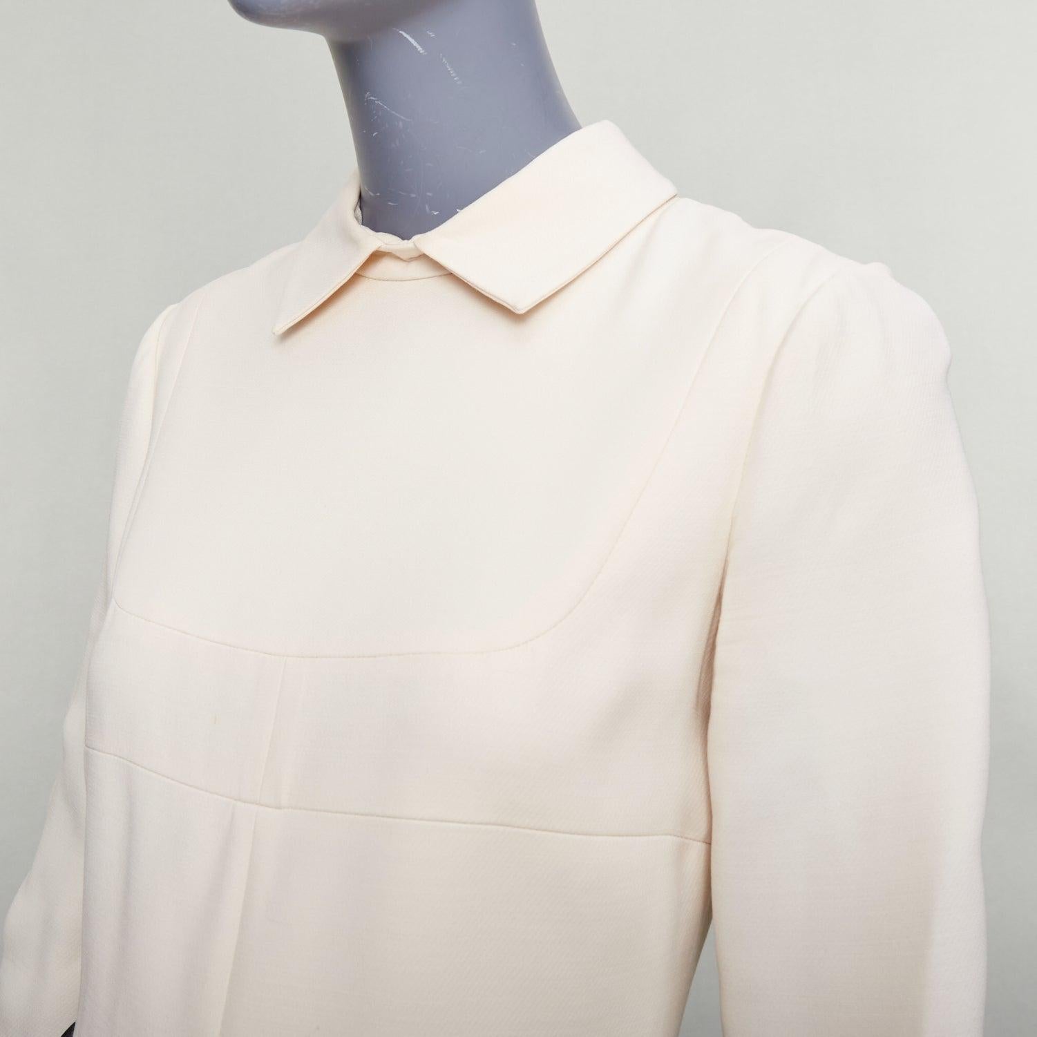 VALENTINO cream red black wool silk colorblocked cocktail dress US4 S
Reference: GEGG/A00071
Brand: Valentino
Designer: Pier Paolo Piccioli
Material: Wool, Silk
Color: Cream, Red
Pattern: Solid
Closure: Zip
Lining: Cream Silk
Extra Details: Back