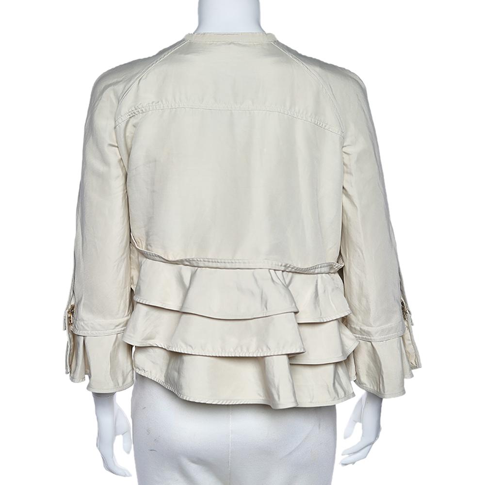 Meticulously tailored into an effortlessly-charming shape, this jacket from the House of Valentino will grant your appearance elegance and grace. It is stitched using cream ruffled cotton and is enhanced with a zip front detail. Unique and
