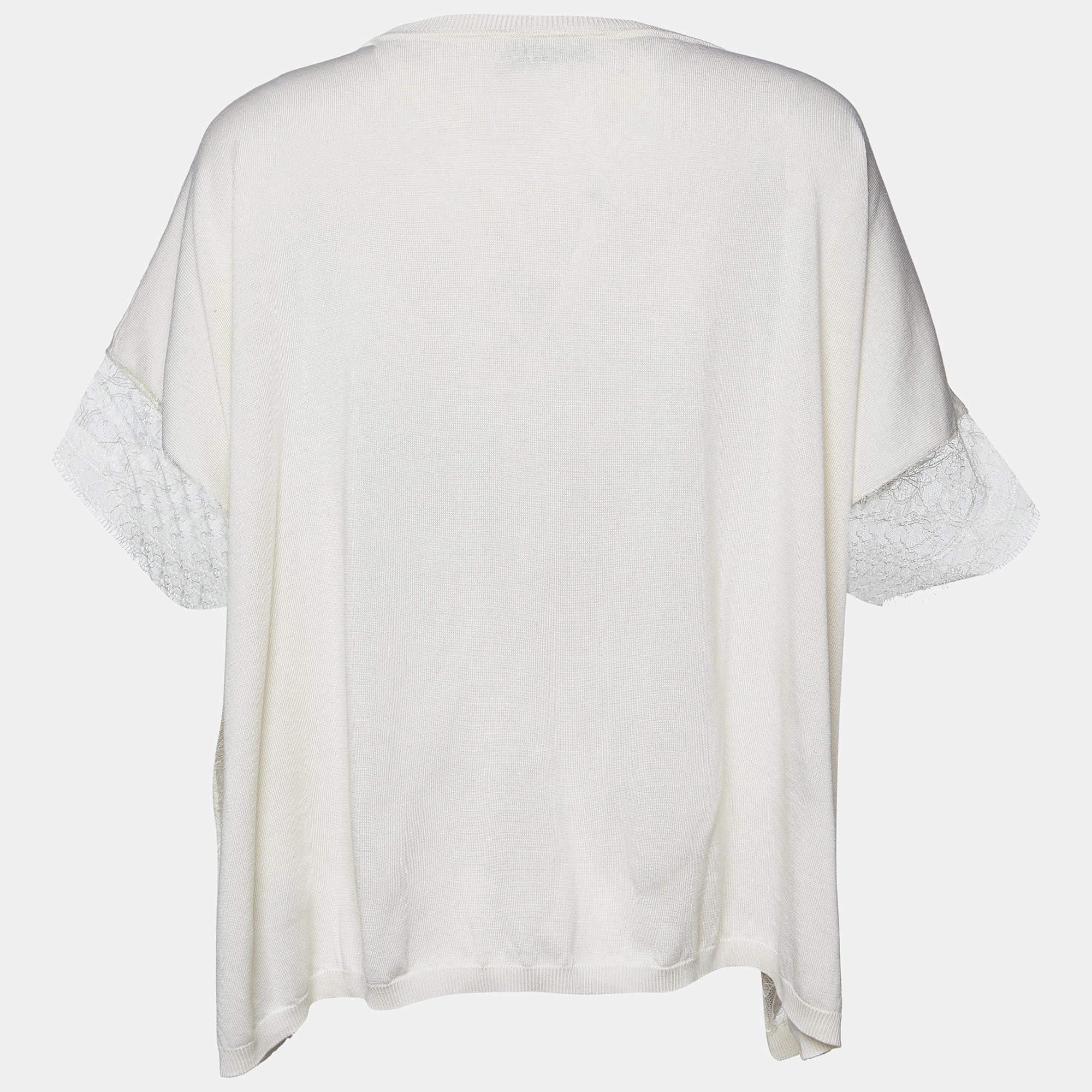 The Valentino jumper is an exquisite blend of luxury and sophistication. This pullover features delicate lace trim, combining cozy comfort with feminine elegance for a timeless and versatile wardrobe essential.

Includes: Price Tag