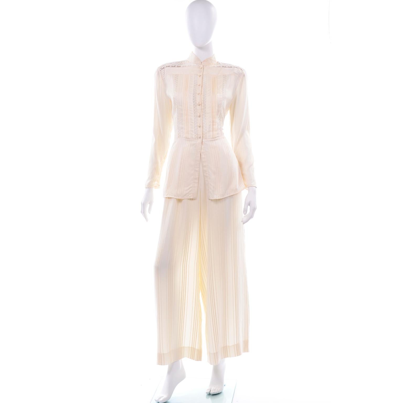 This vintage Valentino two piece cream semi sheer silk pant and blouse set is so dreamy! This would be a nice evening dress alternative for a dressier occasion. We love the lace detailing and pleated bust on the blouse and the wide leg flowy pants.