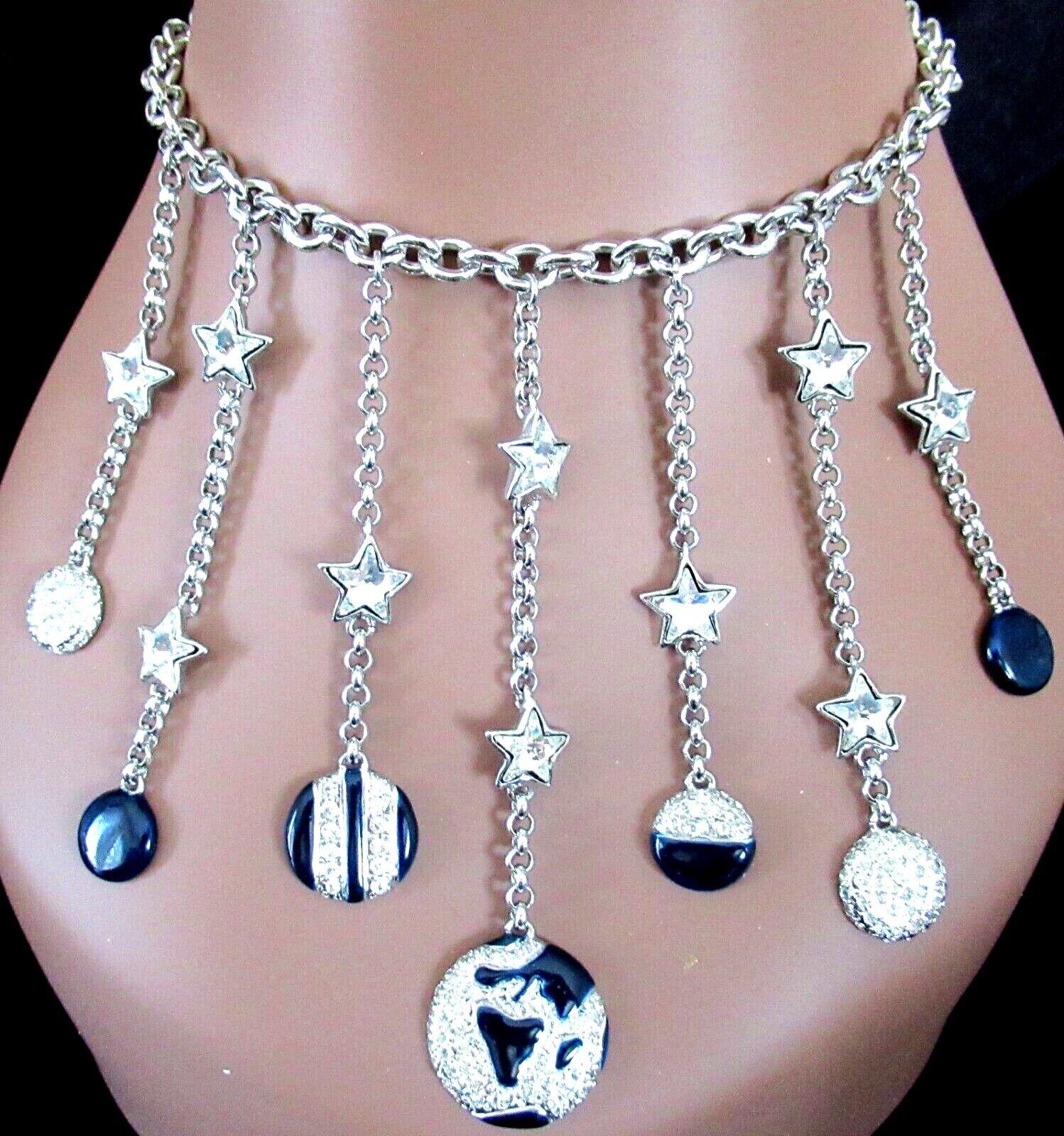 Simply Beautiful!  Vintage Valentino Crystal and Enamel Celestial Moons and Stars Multi Strand Silver Drop Runway Necklace. Featuring 7 drop strands of Sparkling Crystal and Enamel Celestial Moons and Stars. So effective and drapes beautifully.