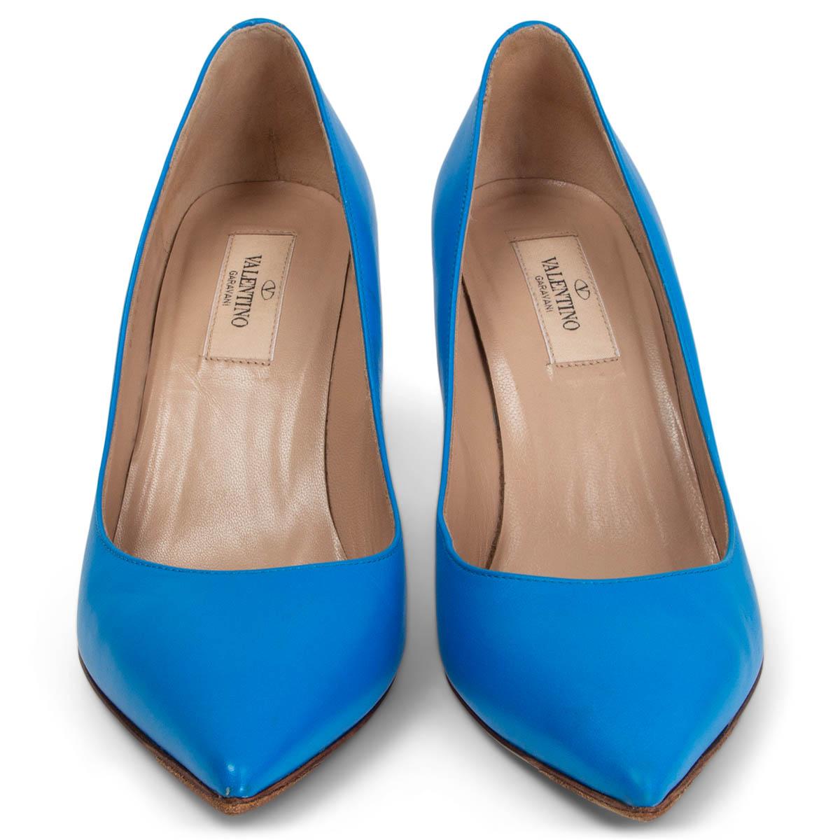 100% authentic Valentino Rockstud pointed-toe pumps in cyan blue calfskin with signature Rockstud on the heel. Have been worn with a few scratches on the heel and on the inside part of the right shoe. Overall in good condition. Come with dust bag.