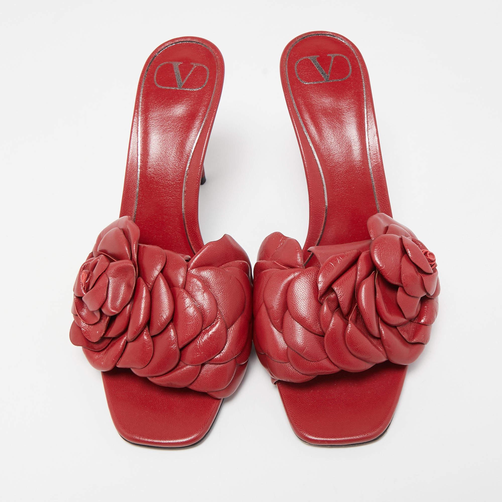 Infused with romantic aesthetics, these Valentino sandals are captivating in a red shade. They are made from leather and are appealing with a rose motif on the upper and are balanced upon 9.5 cm heels.

Includes
Original Dustbag