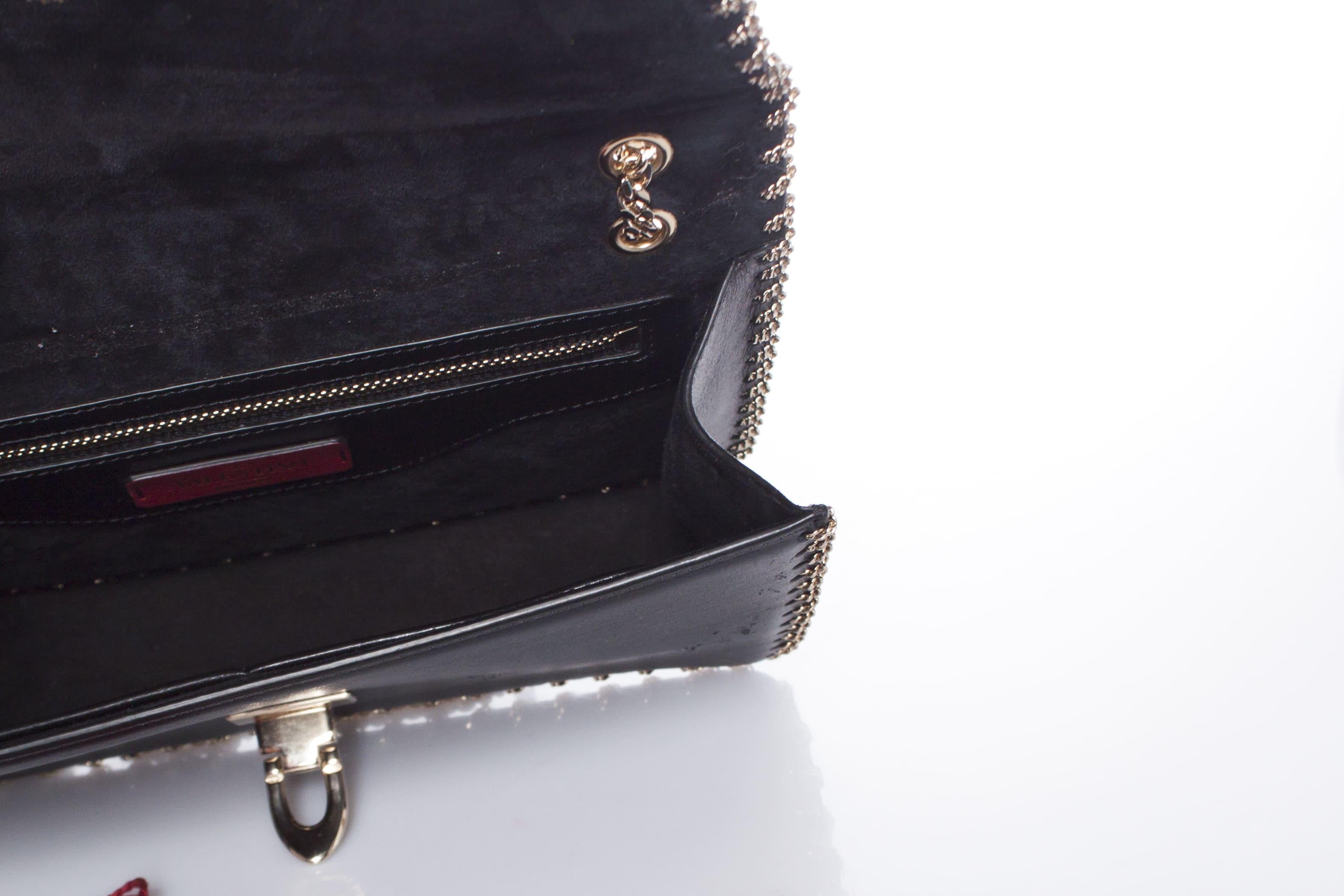Women's or Men's Valentino, Demilune chain leather shoulderbag in black. For Sale