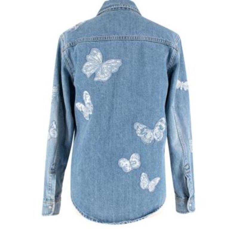 Valentino denim butterfly embroidered shirt

-regular fit
-butterfly pattern
- two pockets
-front button closure.

Material
100% cotton

Washing
Dry clean only 

MADE IN ITALY

Condition 9.5/10

PLEASE NOTE, THESE ITEMS ARE PRE-OWNED AND MAY SHOW