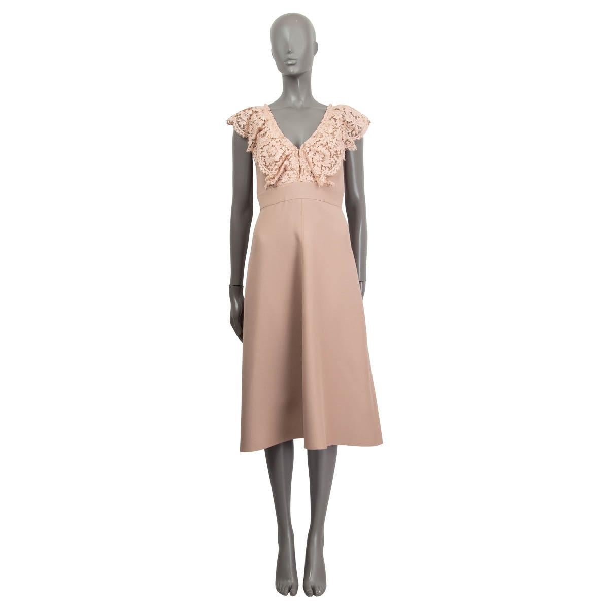 100% authentic Valentino sleeveless flared dress in dusty rose virgin wool (65%) and silk (35%). Embellished with lace straps. Opens with a concealed zipper and hook on the back. Lined in dusty rose silk (100%). Has been worn and is in excellent