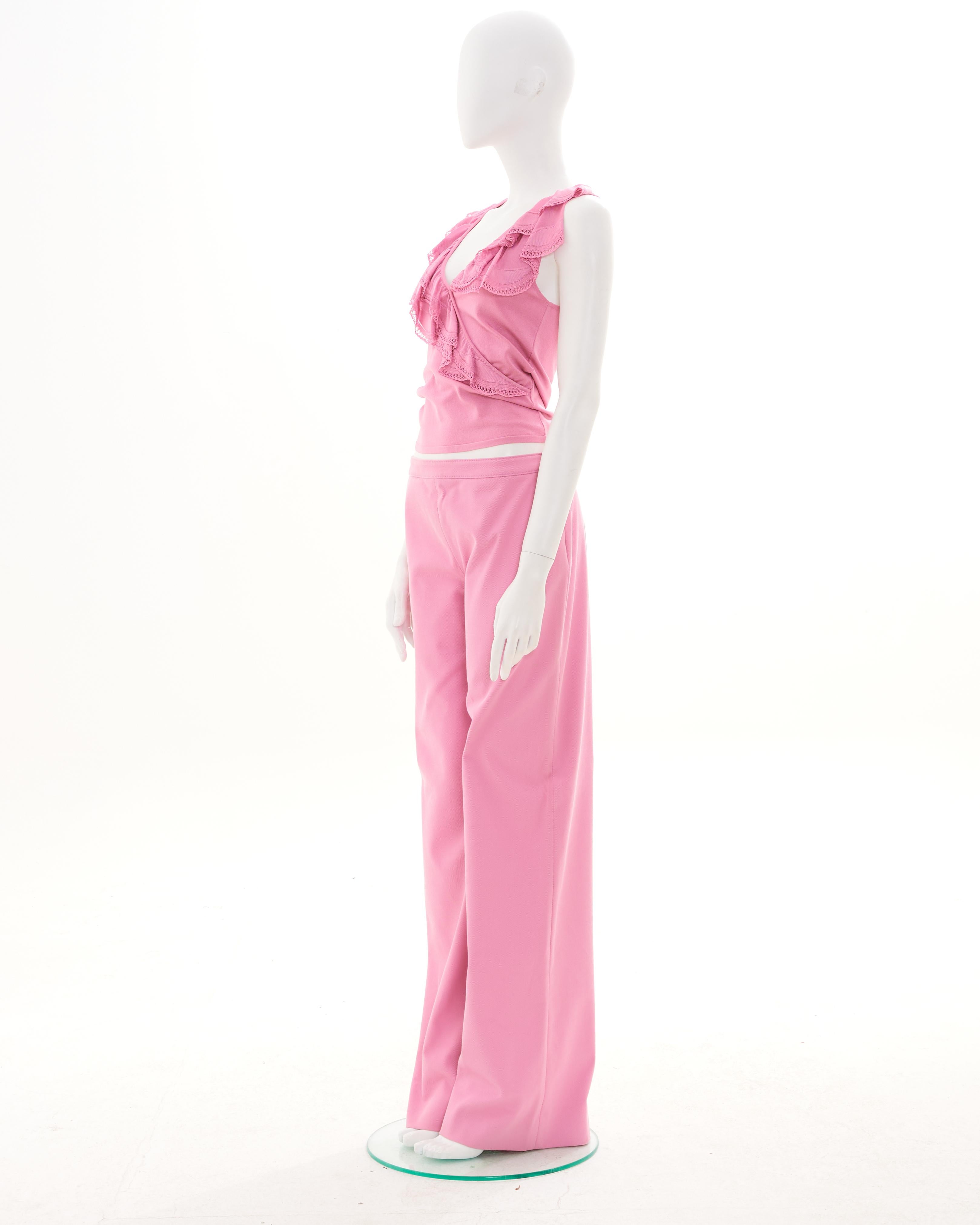 - Designed by Valentino
- Sold by Skof.Archive
- Early 00's
- Pink Top
- Lace Fringe Details
- One Short Sleeve
- Pink Pants
- Relaxed Fit
- Made in Italy
- Excellent Condition
- Size: FR 38 - EN 42 - UK 10 - US 8 (EU)