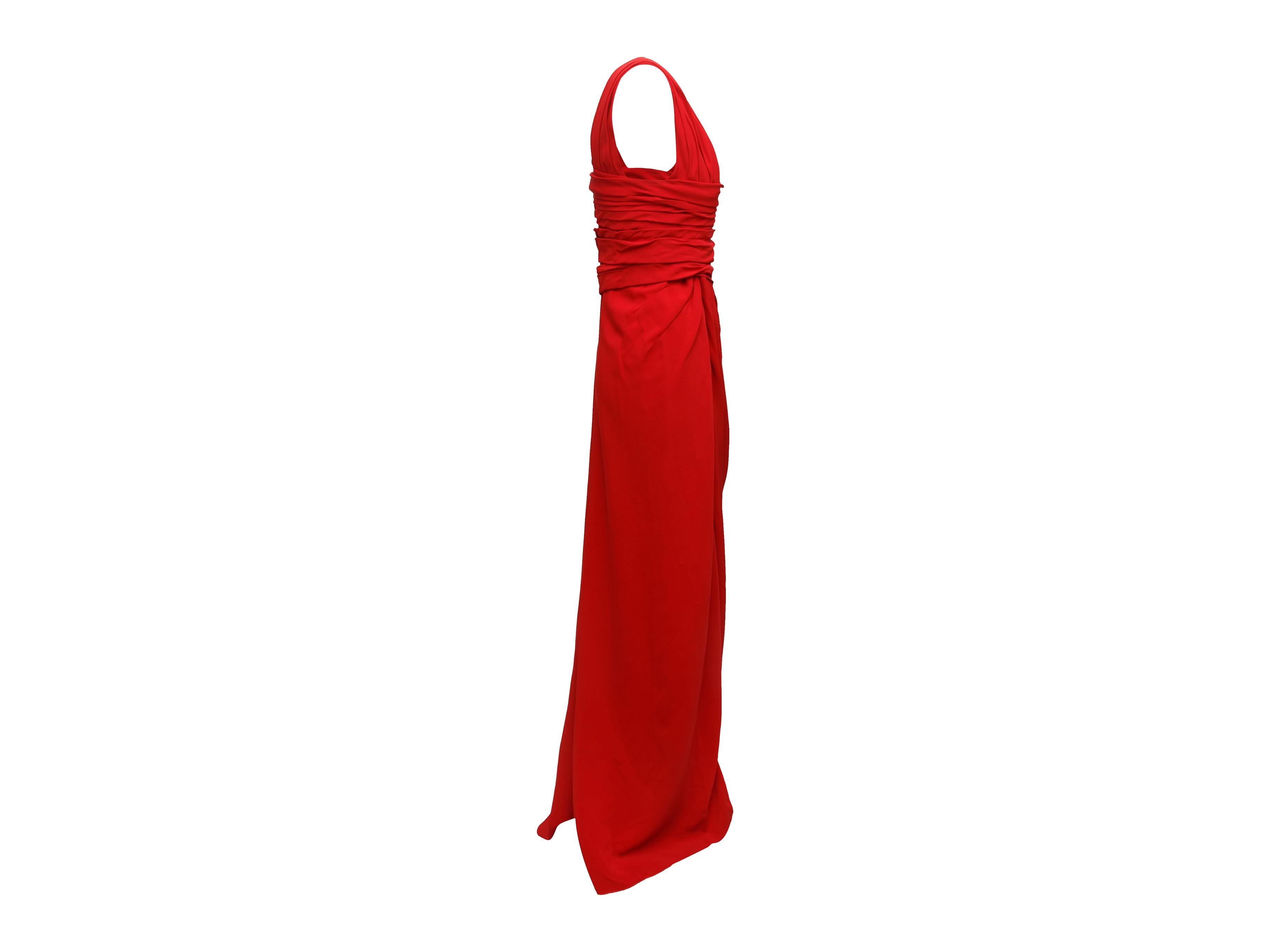 Product details:  Red asymmetrical pleated gown by Valentino.  Edie Falco's 2011 Golden Globes dress.  One shoulder design.  Draped pleats at bodice create a flattering silhouette.  Concealed side zip closure.  30