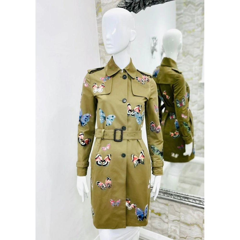 Valentino Embroidered Butterfly Trench Coat

Khaki green, belted coat fully embellished with multi-coloured embroidered butterflies. With butterfly print. 

Additional information:
Size: 38IT
Composition: 100% Cotton 
Condition: Very Good/Excellent
