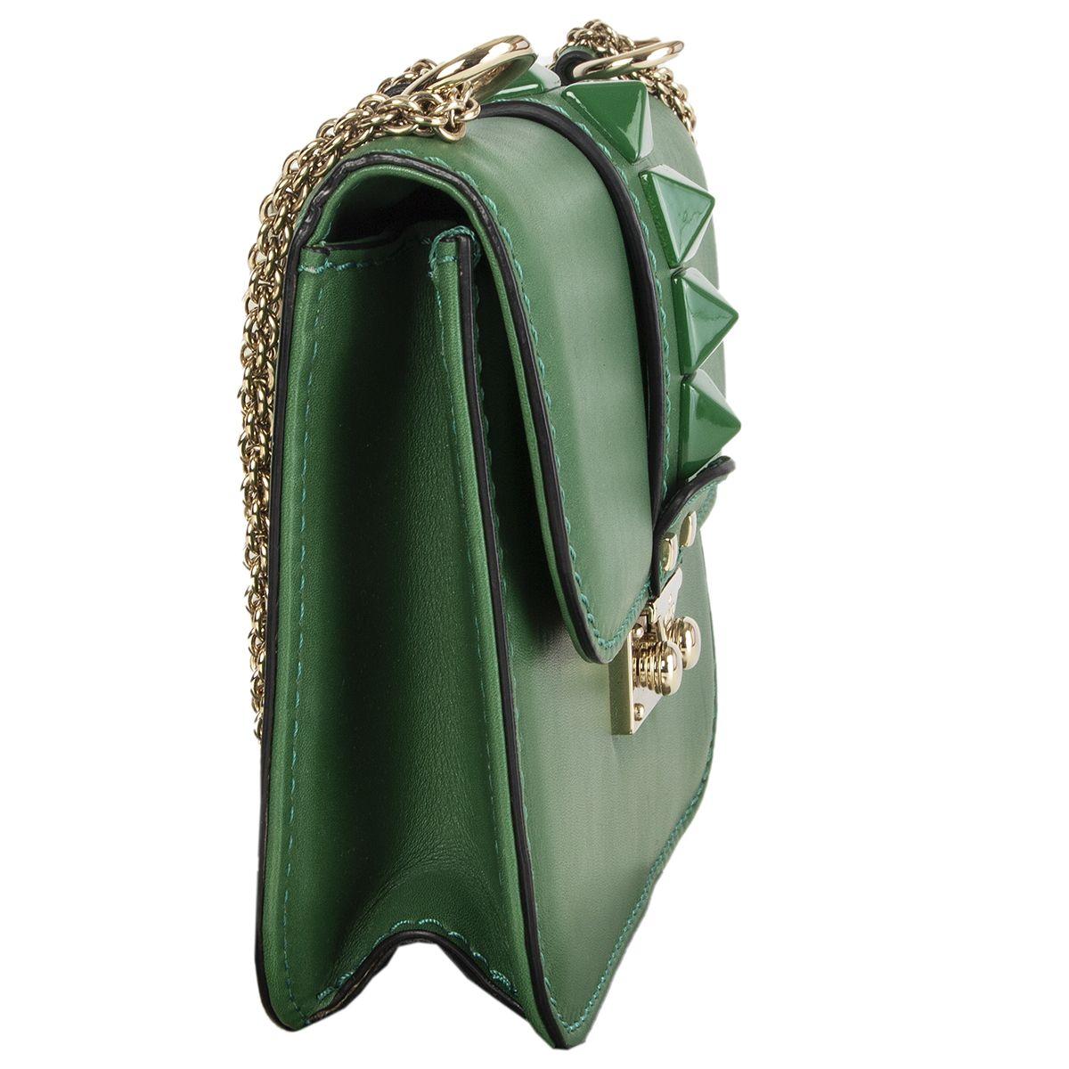 Valentino 'Glam Lock Rockstud Small' chain shoulder bag in green smooth calfskin featuring green ruthenium finish metal studs and loght gold-tone hardware. Opens with a tuck catch closure with engraved logo. Lined in beige canvas with one zip pocket