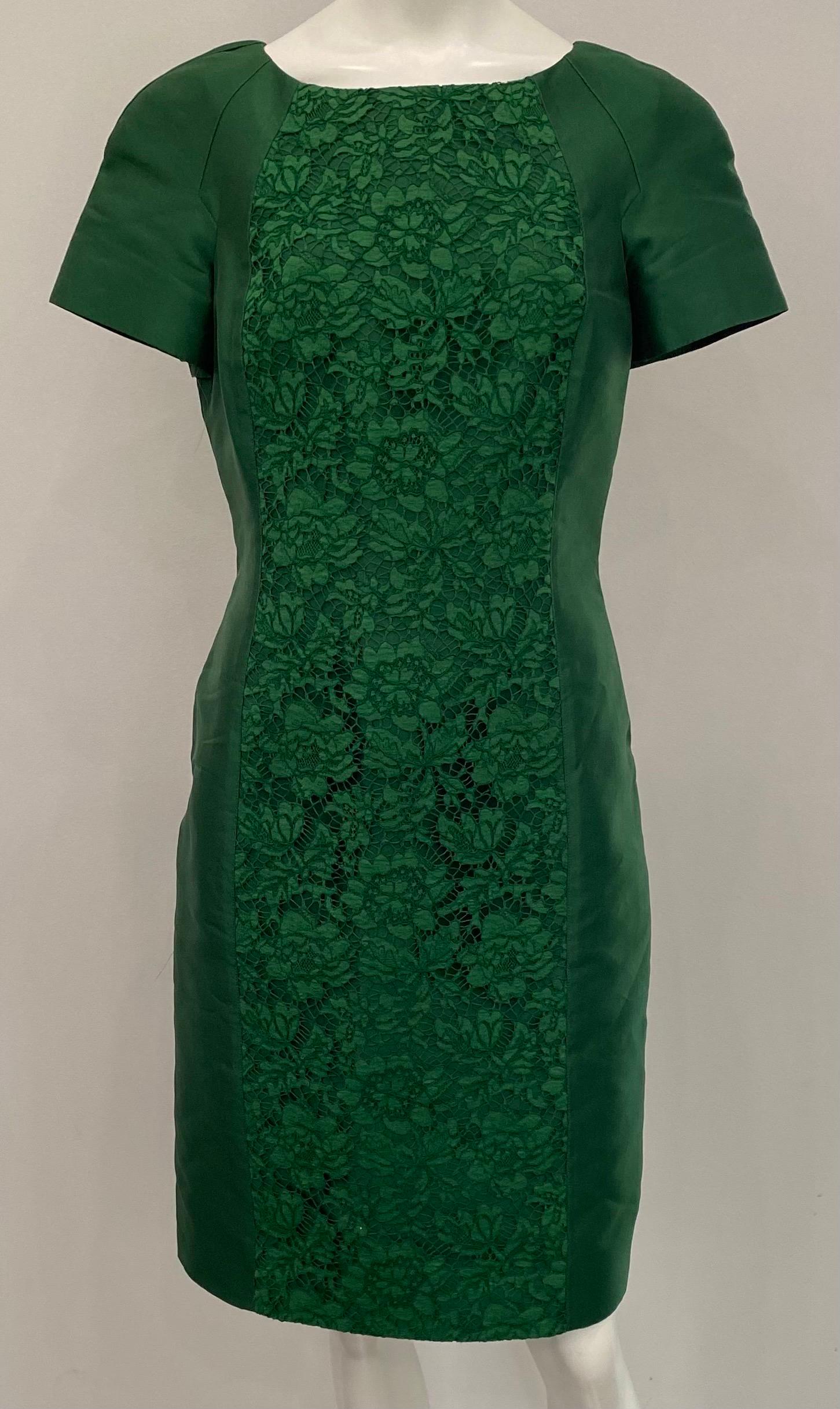 Valentino Emerald Green Silk and Lace Cap Sleeve Sheath Dress - Sz 8 This Sheath sytle silk dress is in a beautiful emerald green color with a lace insert panel along the front of the dress. The dress has a cap drop sleeve, scoop neckline, center