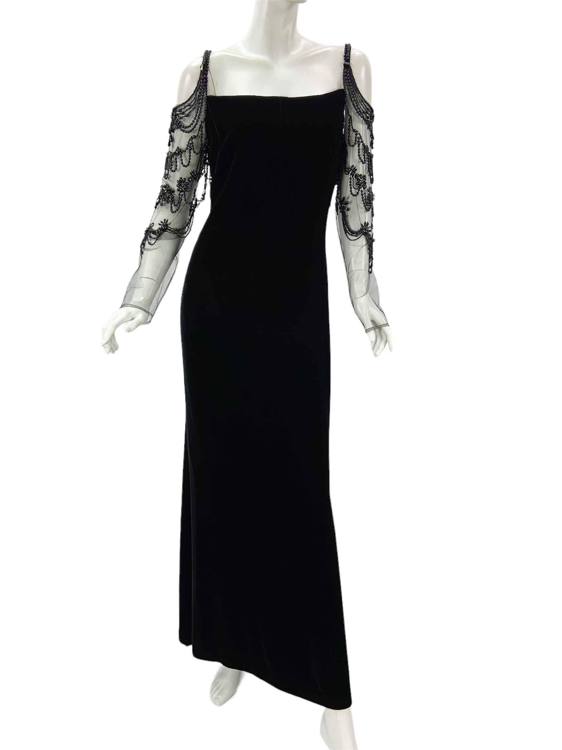 Valentino Black Velvet Beaded Maxi Dress Gown
F/W 2003 Runway Collection
US size - 8
Black velvet 20s inspired Gatsby dress finished with lots of black onyx cabochon and crystals over the tulle. Fully lined, Side zip closure.
Measurements: Length -