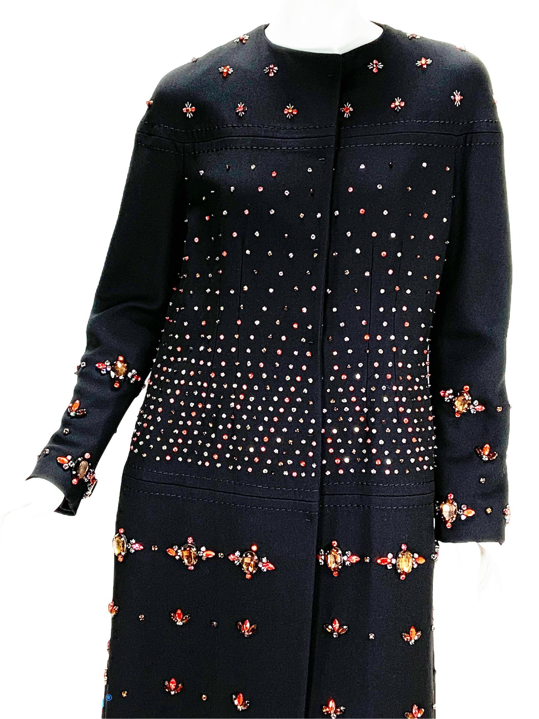Valentino Black Runway Embellished Coat
Designer size 8
F/W 2009 Collection
Fully Embellished with Colorful Glass Beads, Content - 50% Wool, 50% Silk, Two Side Pockets, Fully Lined, Snap Closure.
A-Line Silhouette. Measurements: Length - 42 inches,